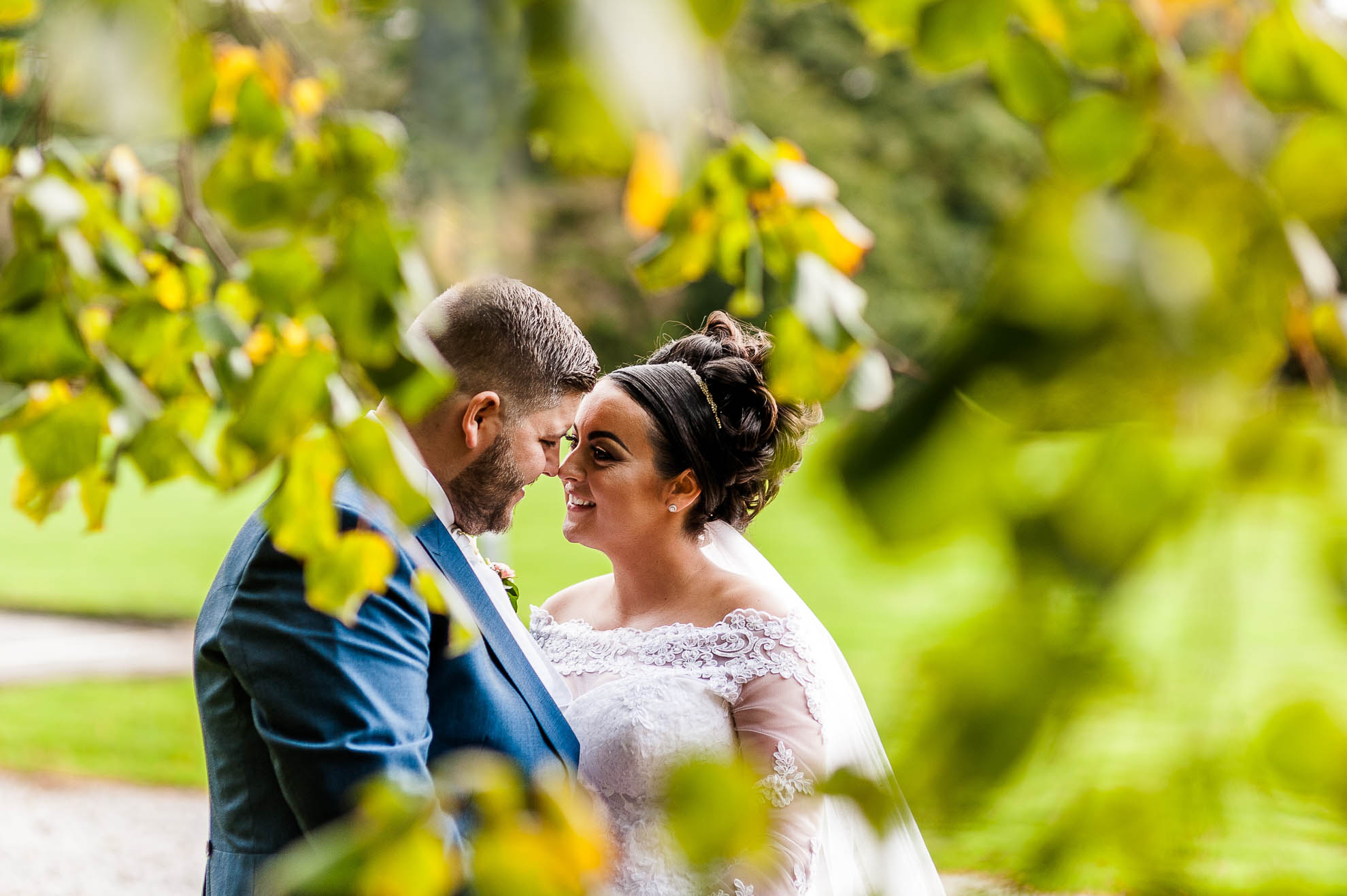 bride and groom kiss