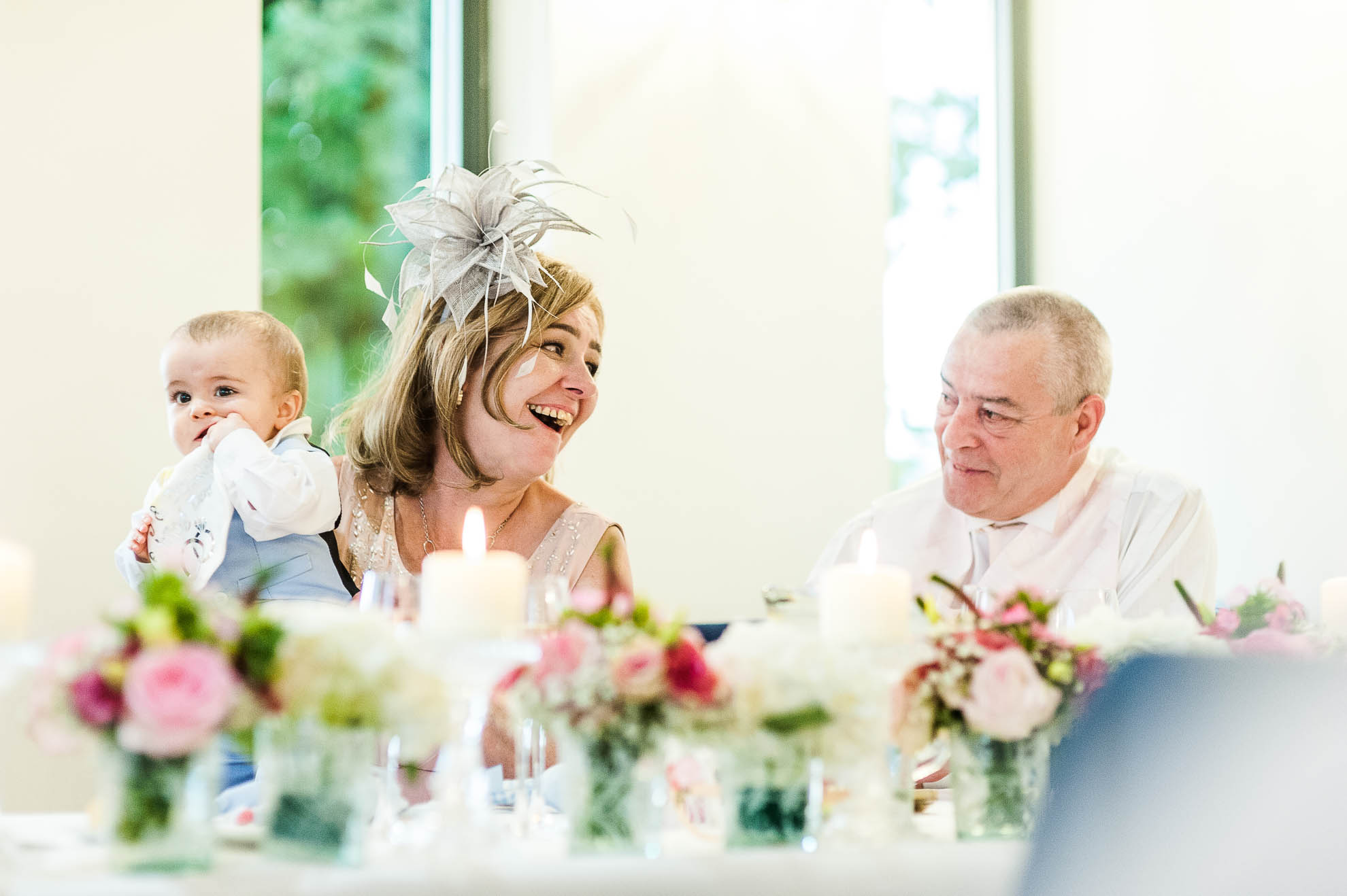 groom's parents laugh 