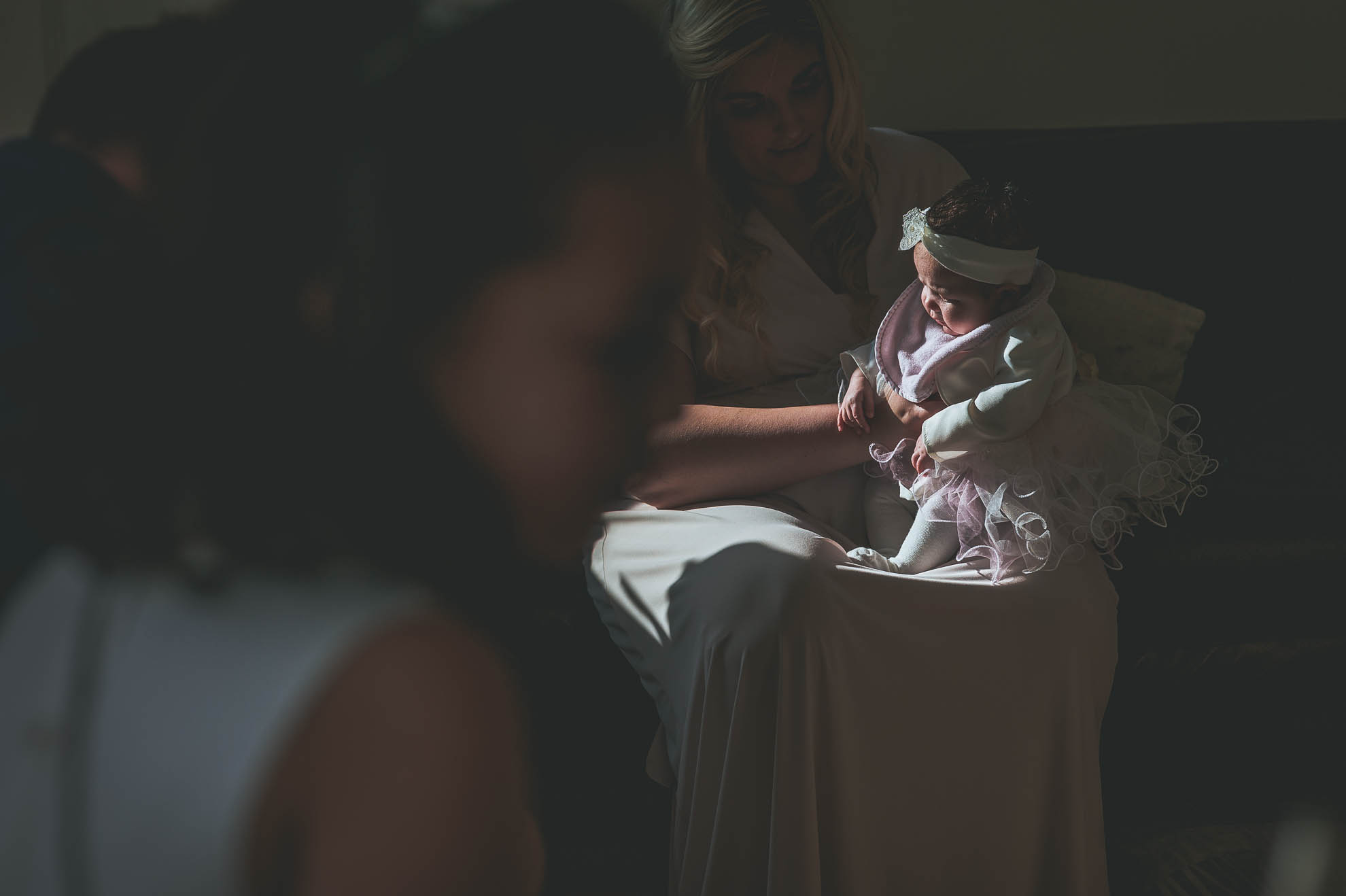 mum holding baby