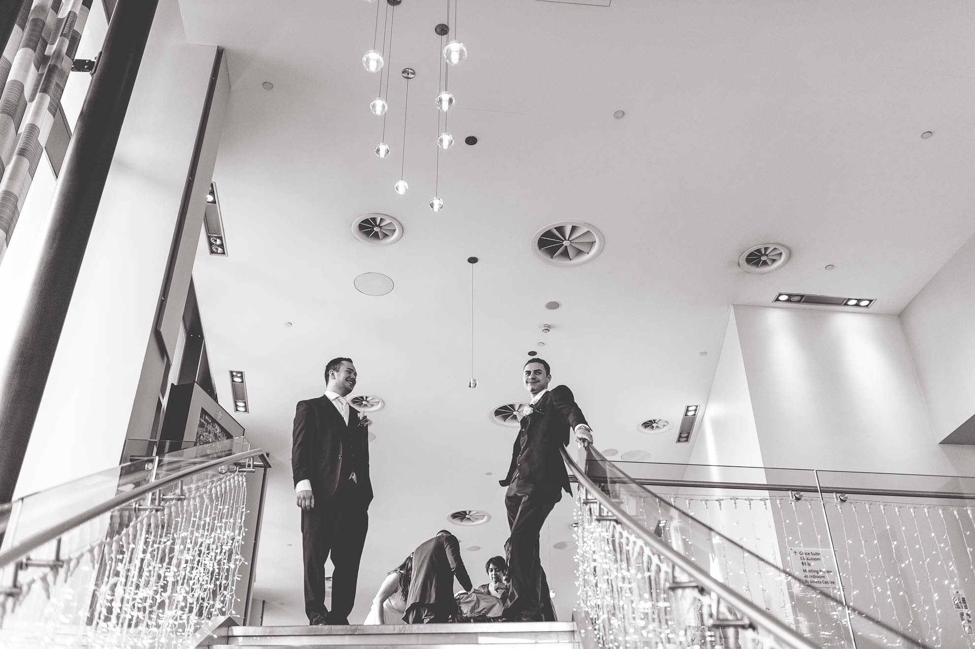 ushers at the top of stairs in Liverpool Hilton