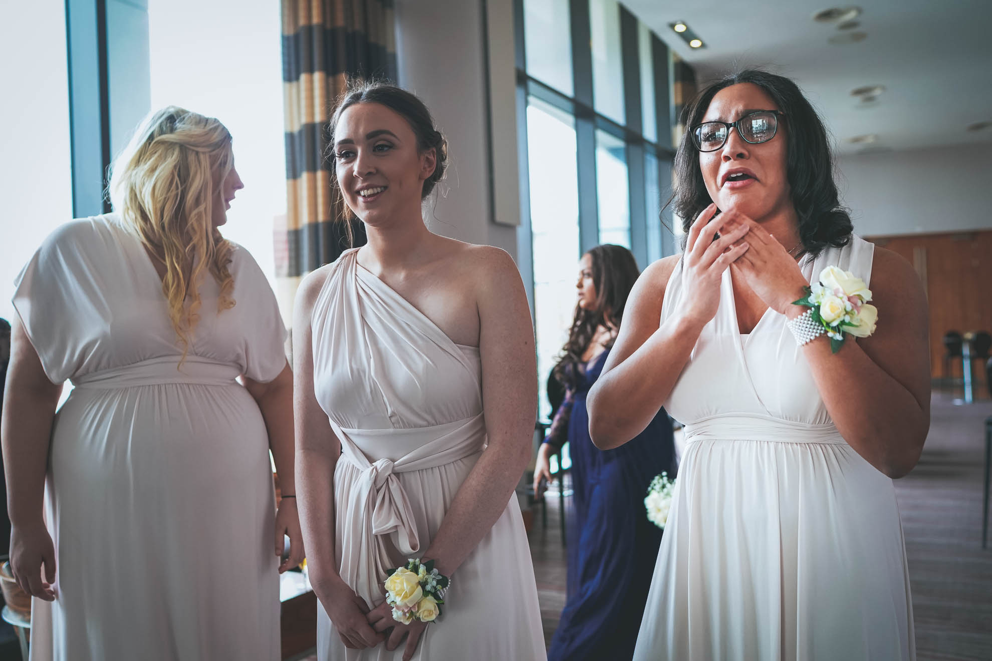 bridesmaids get emotional as bride arrives