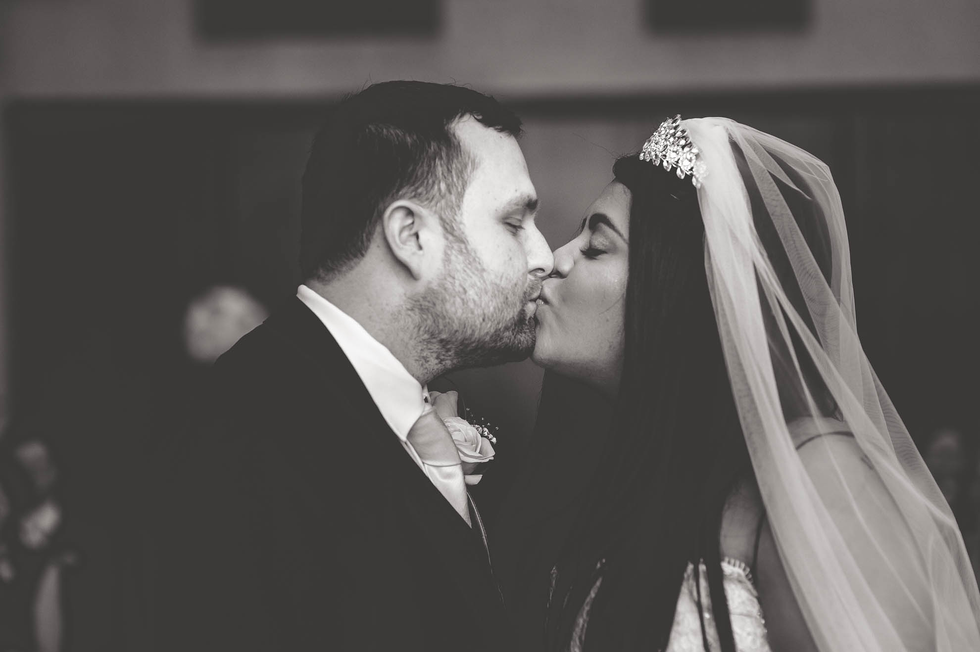 bride and groom kiss
