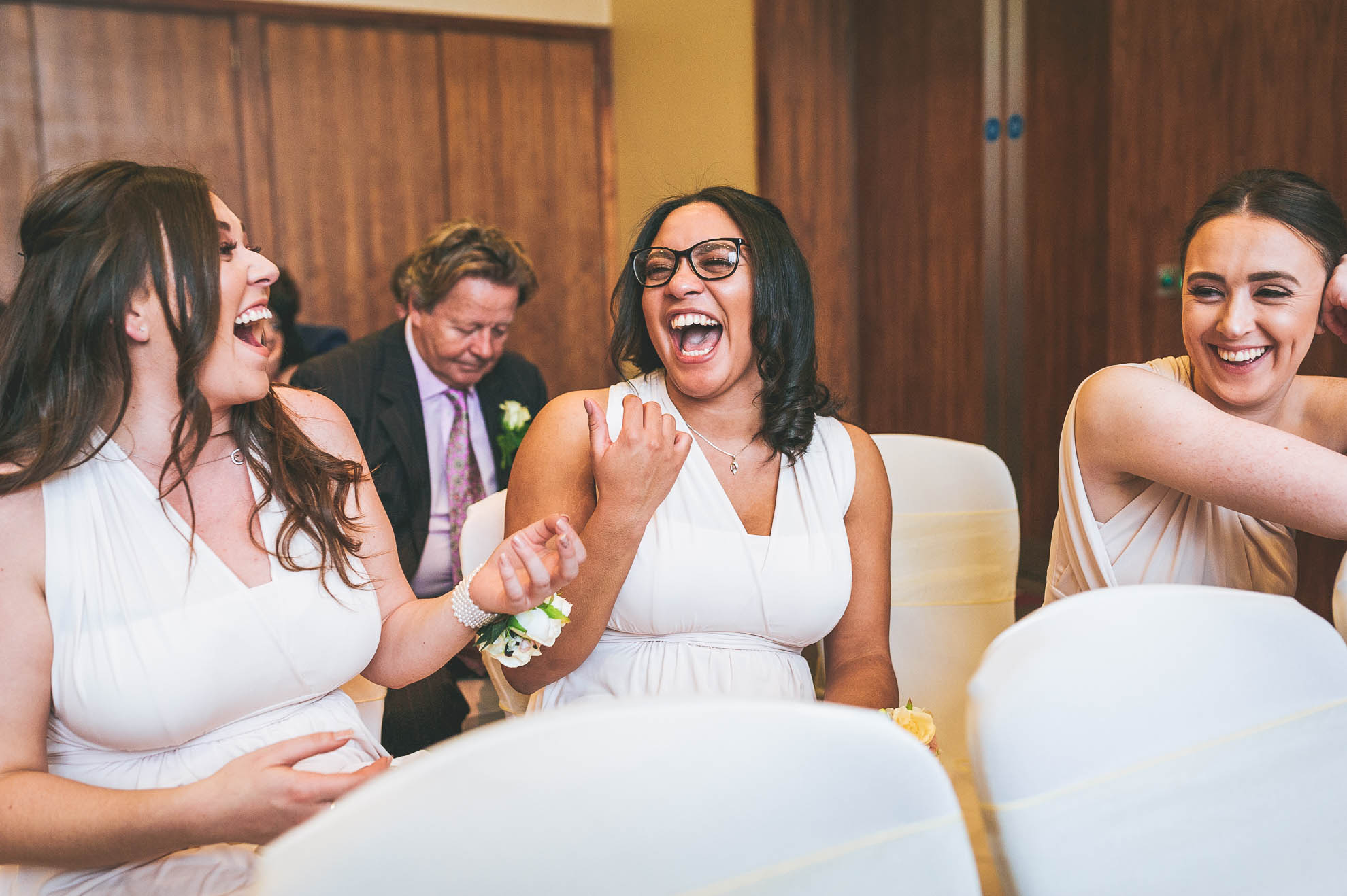 bridesmaids share a joke