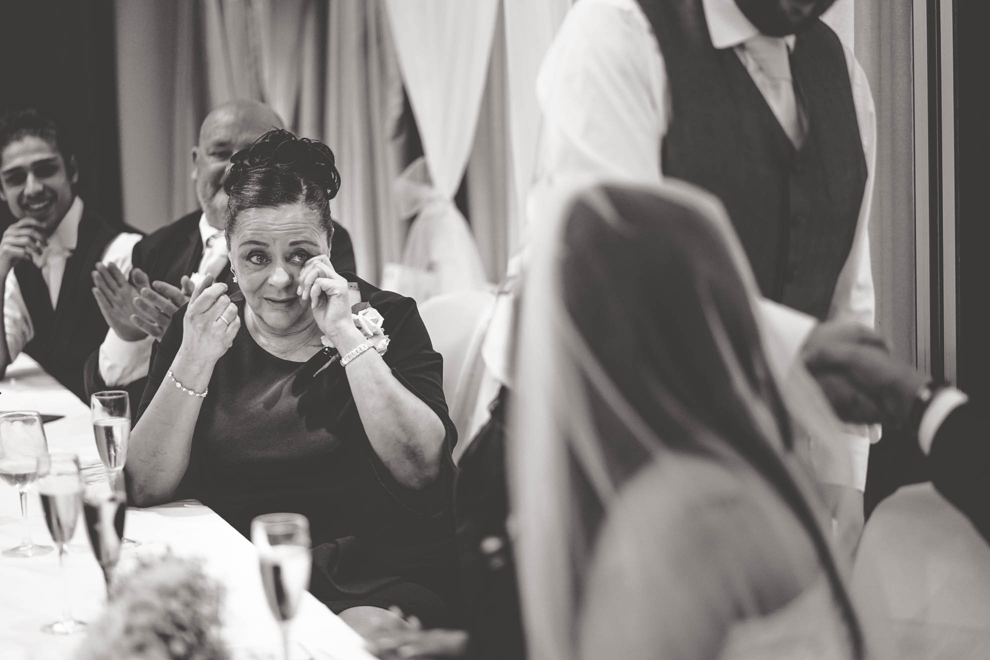mother of the bride sheds a tear