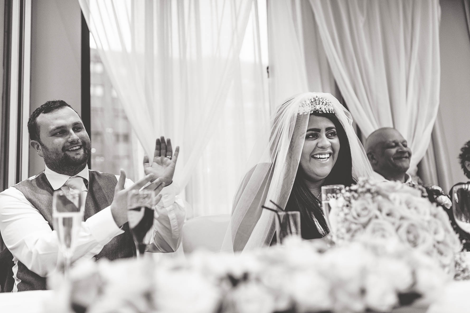 groom and bride laughing