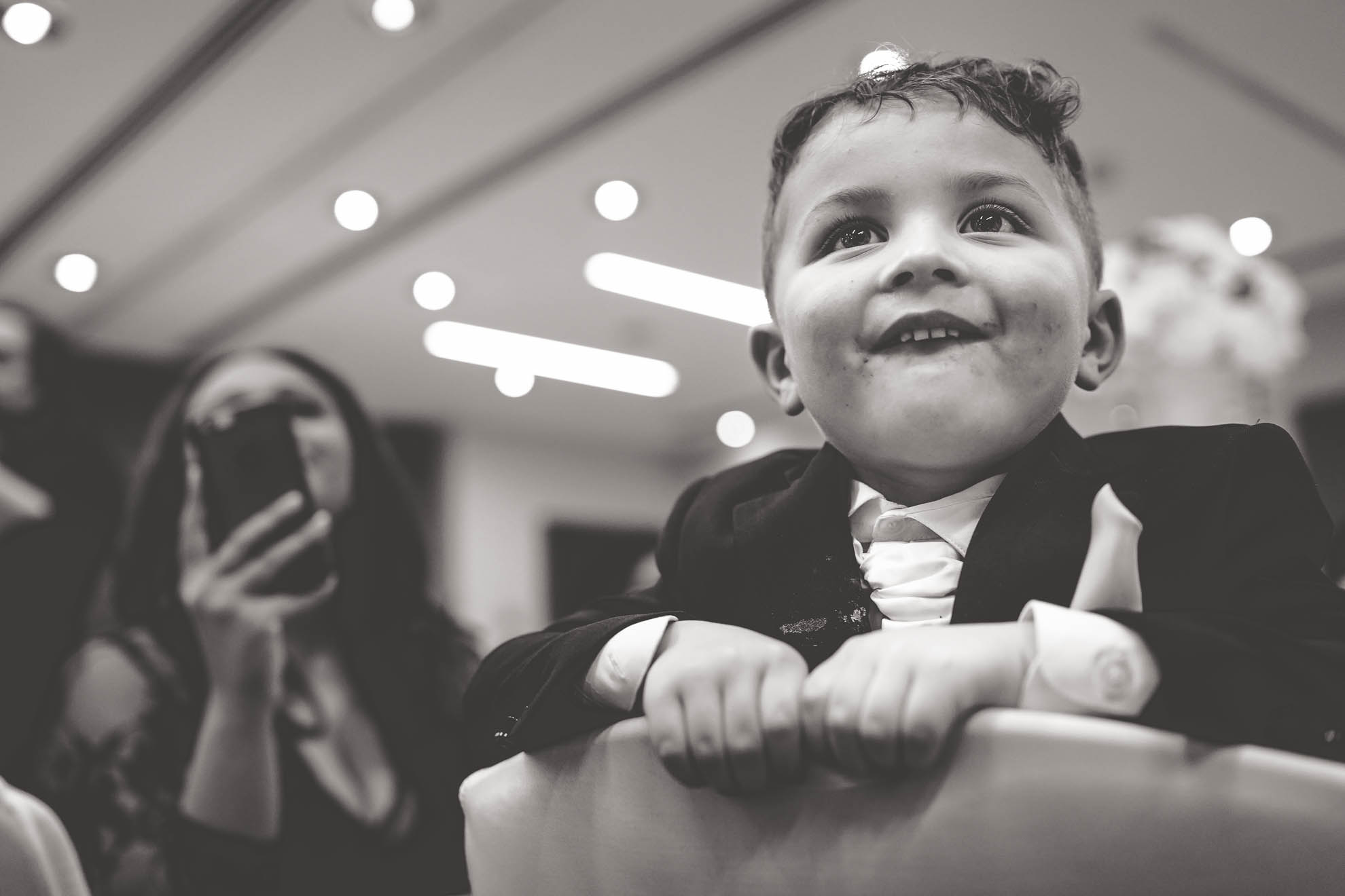 page boy laughs at speeches