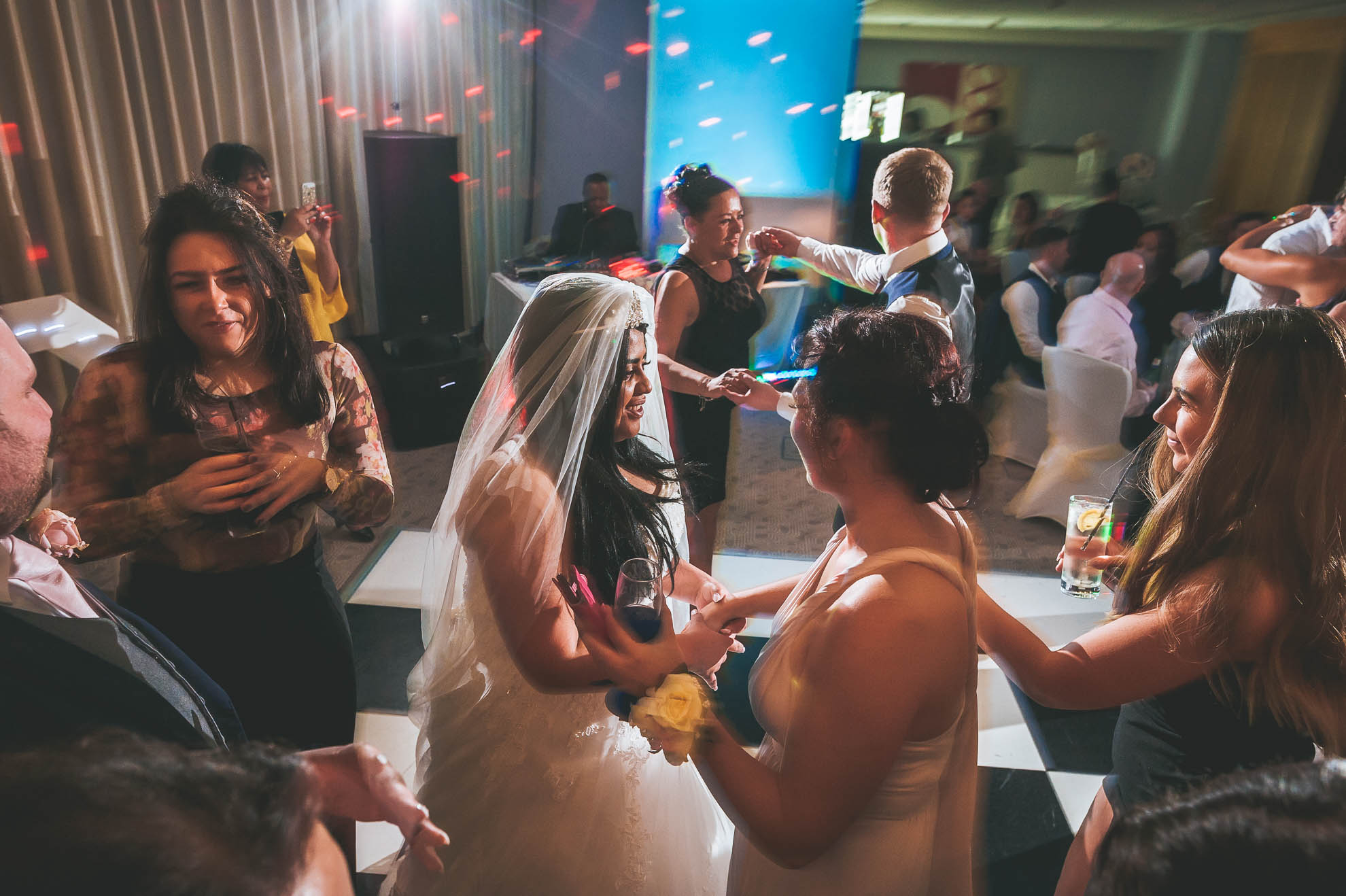 bride dances with guests