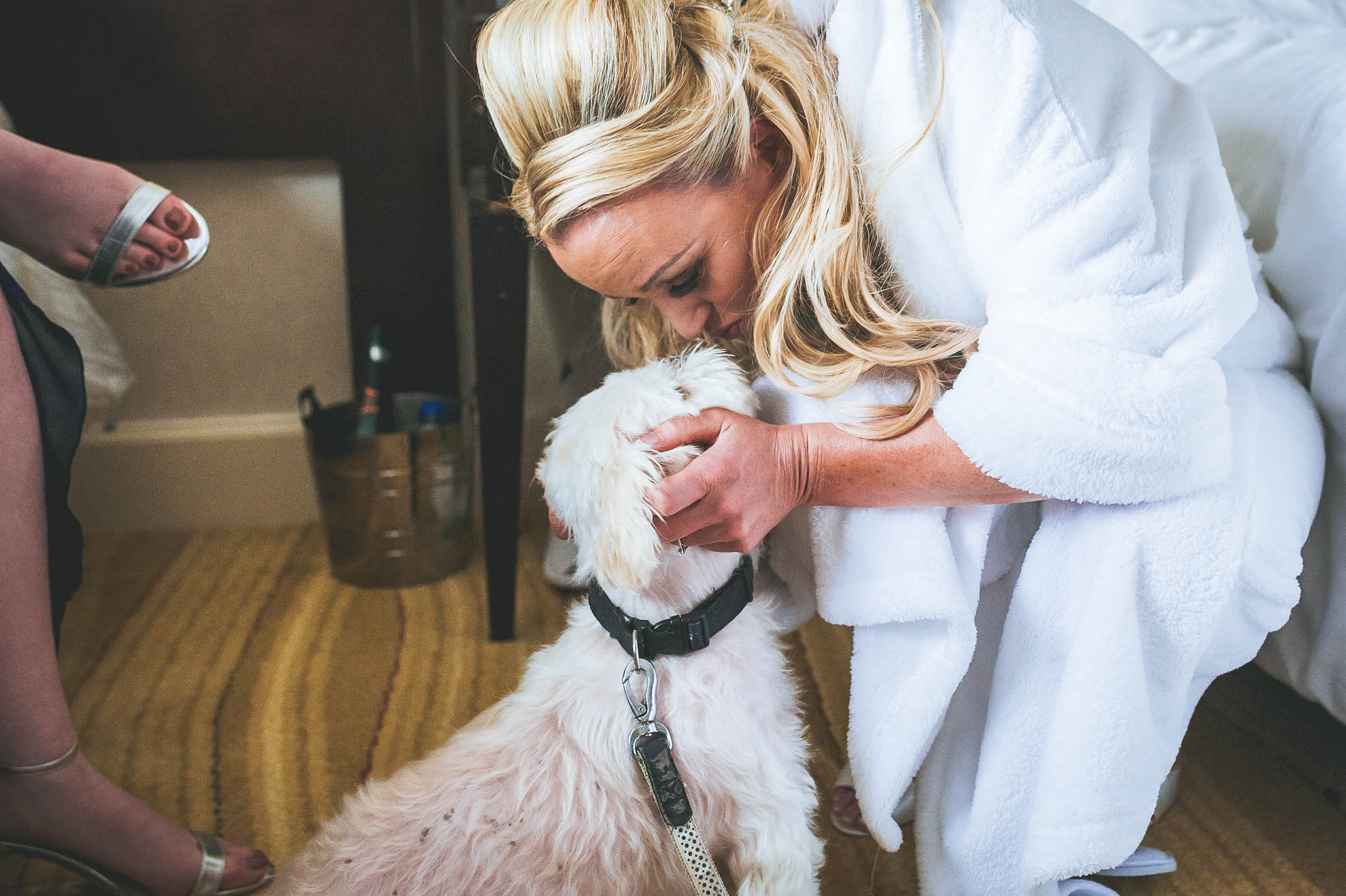 bride hugging dog