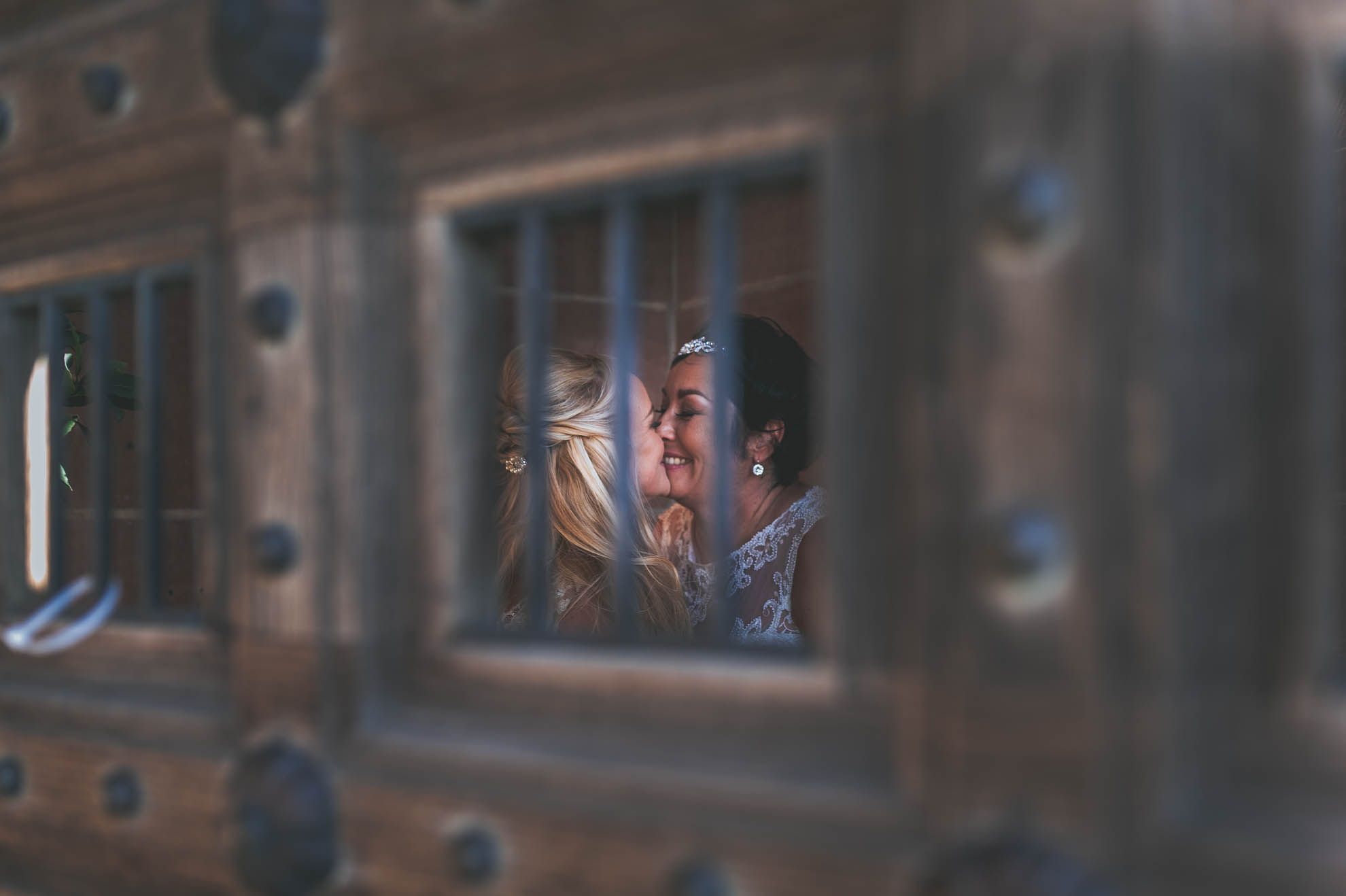 same sex couple kissing