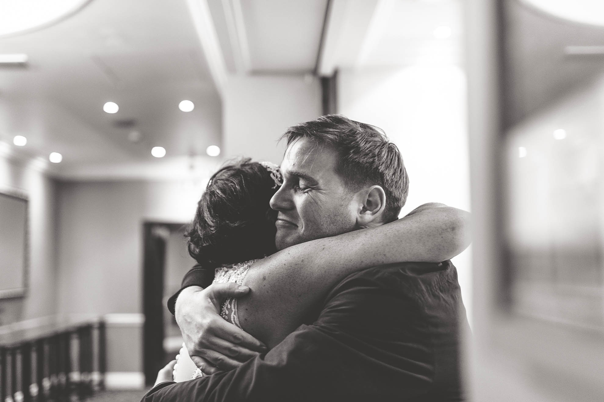 bride hugging guest