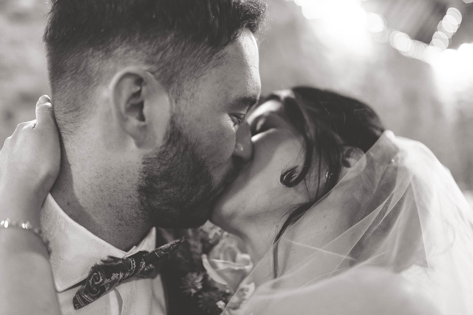 bride and groom kiss