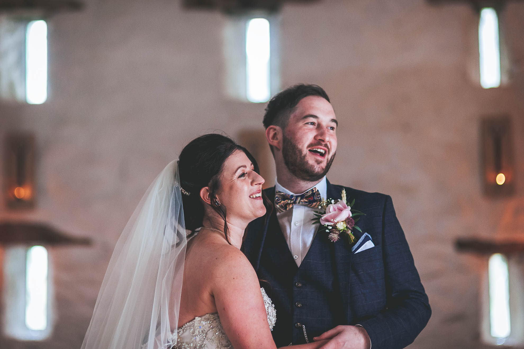 Bride and groom share a joke