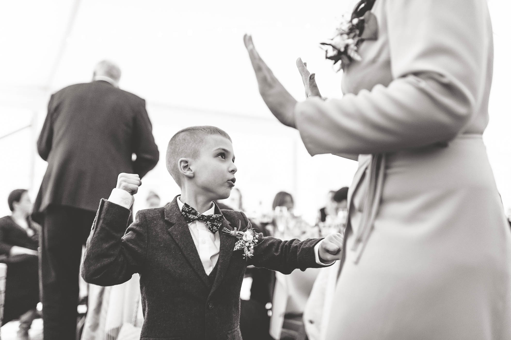 Little boy plays with his mum