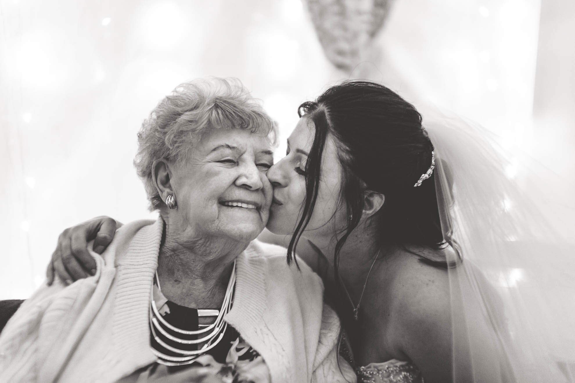 Bride gives nan a kiss