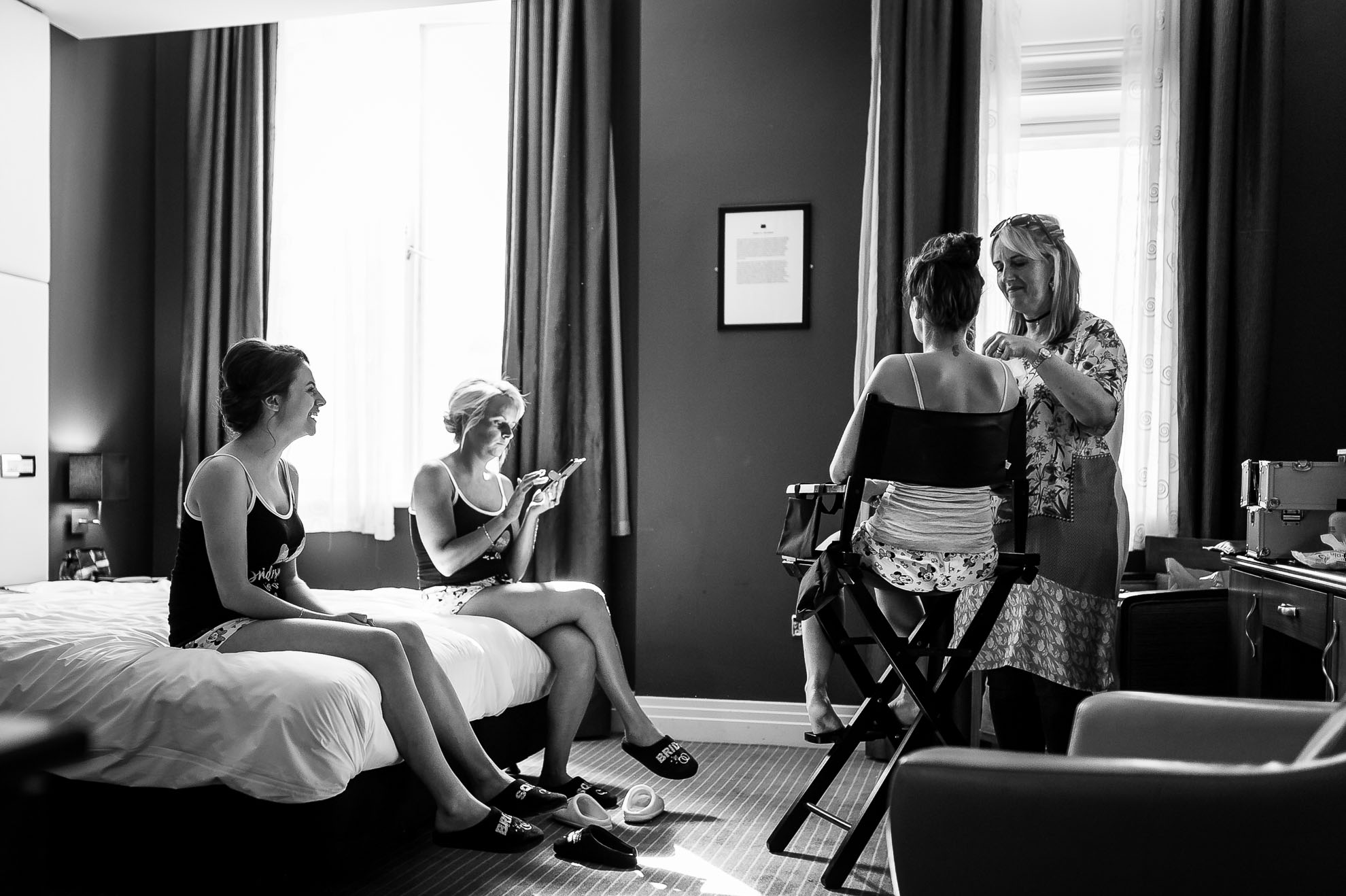 Bride and bridesmaids getting ready