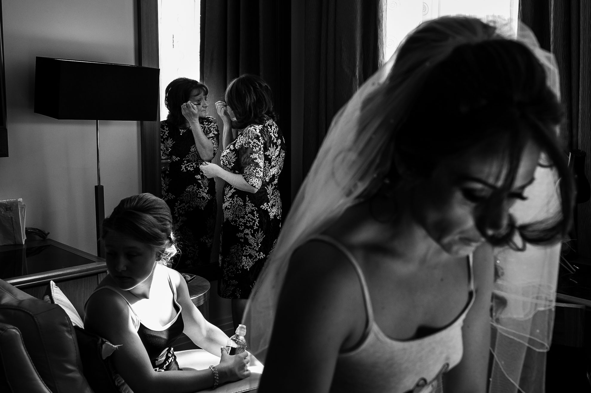 Brides mum applying make up