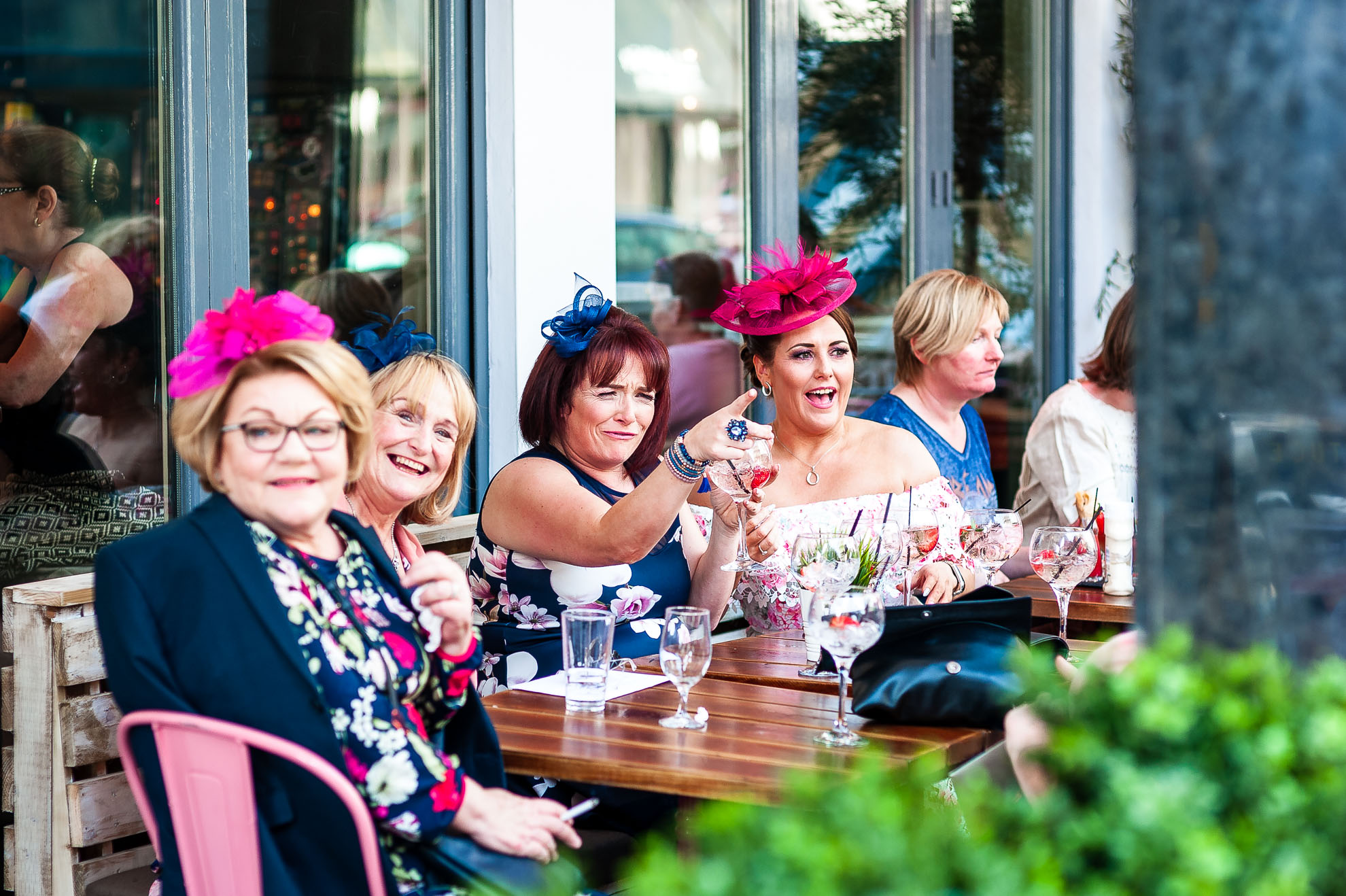 Wedding guests share a joke