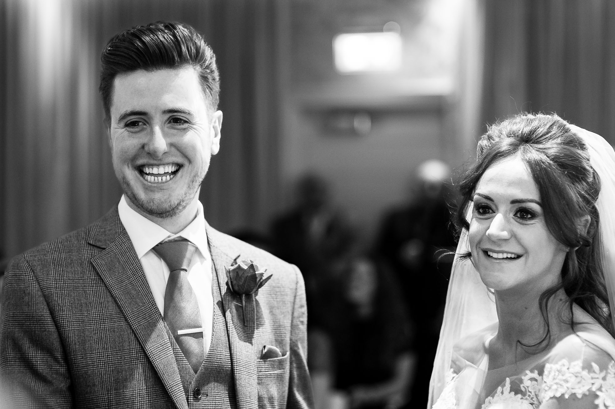Bride and groom laugh 