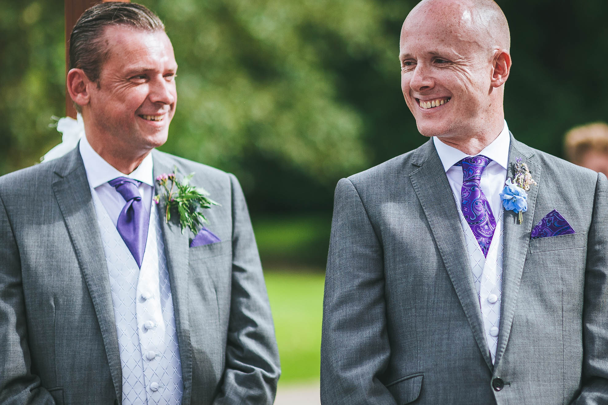 Groom and best man share a joke