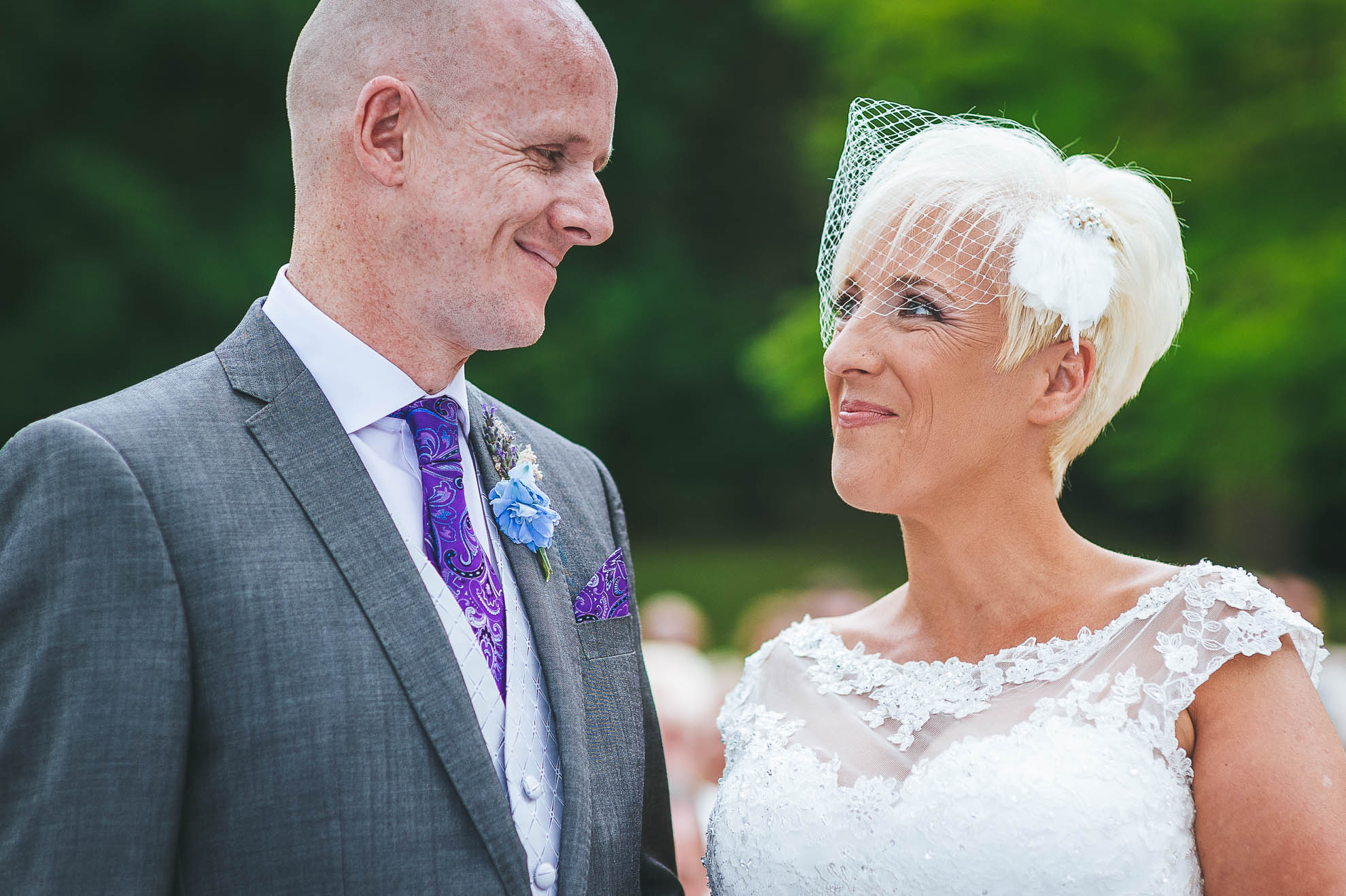 Bride and groom smile together