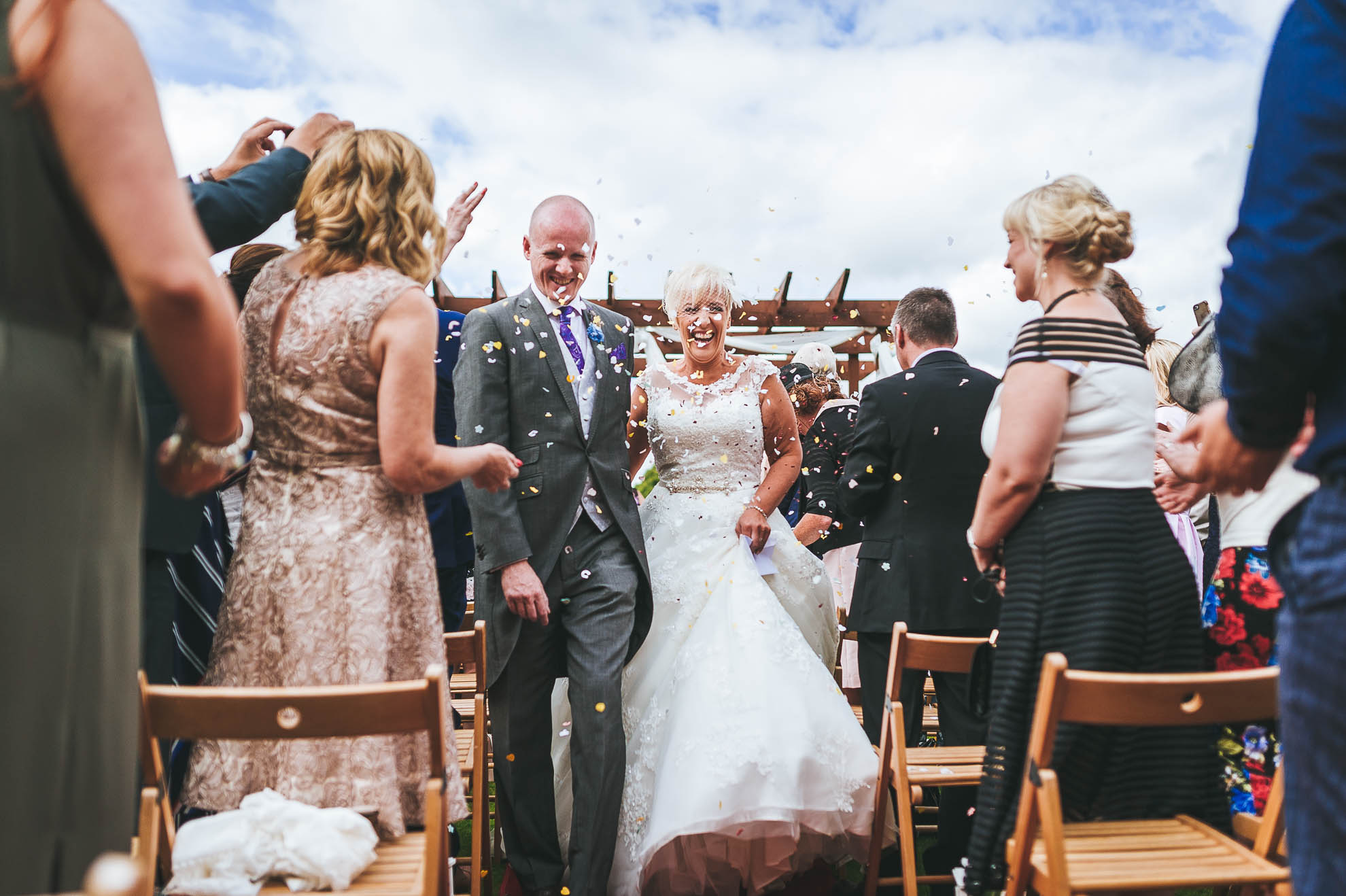 Bride and groom walk back down the aisle