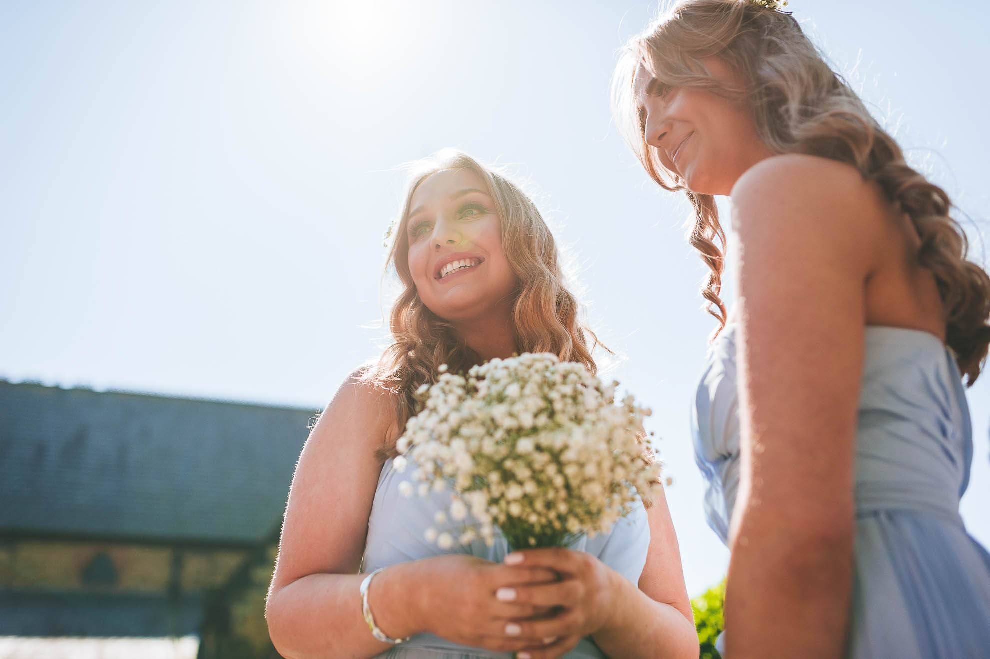 Bridesmaids wait at the church