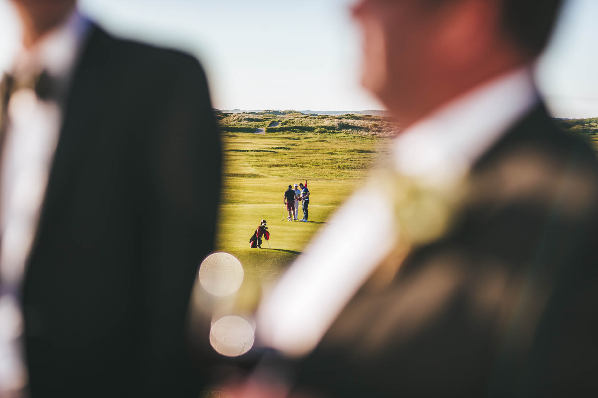 golfers in distance
