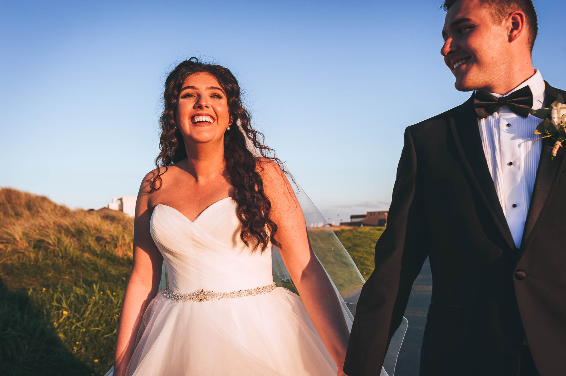 Bride and groom sharing a joke
