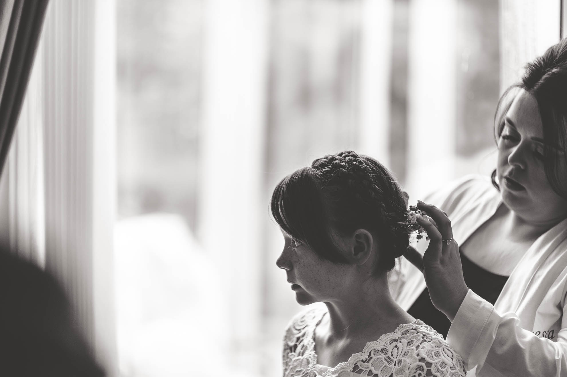 Flower girl having her hair done