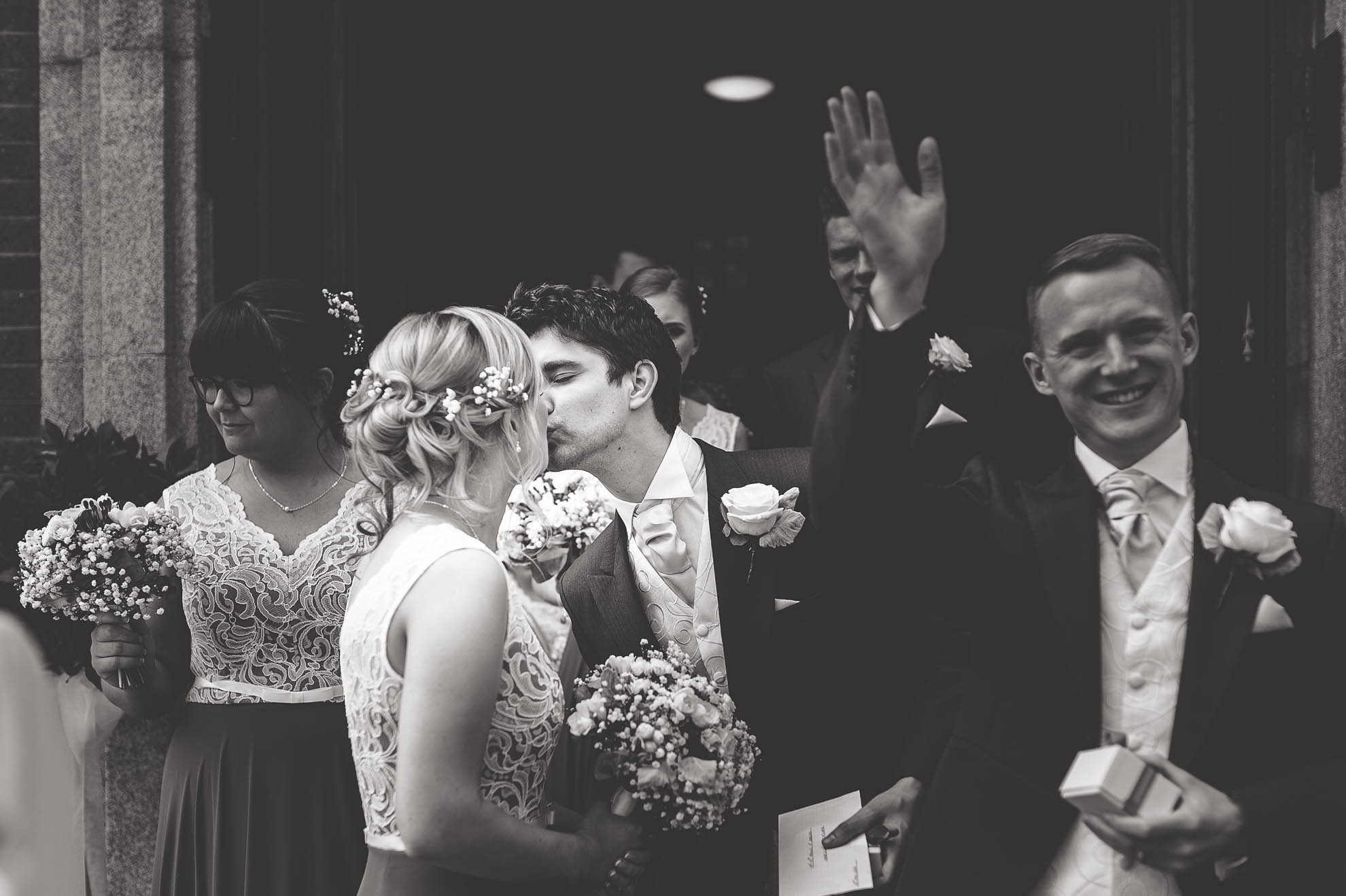 Usher and bridesmaid kiss