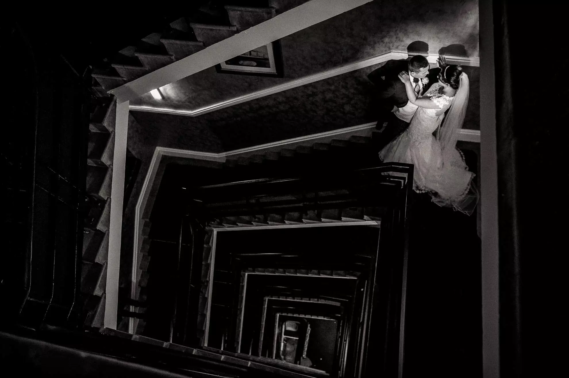 Bride and groom portrait on stairs 