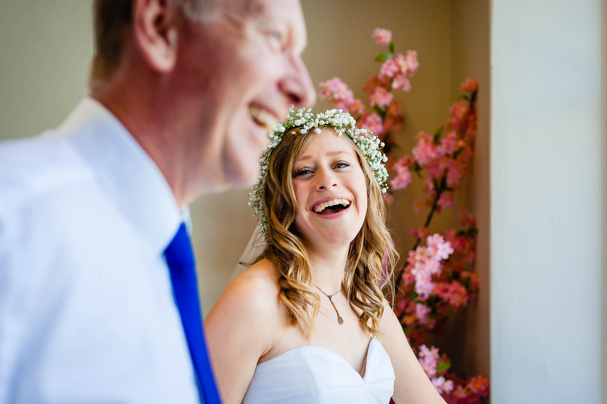 Bride share a joke with her father