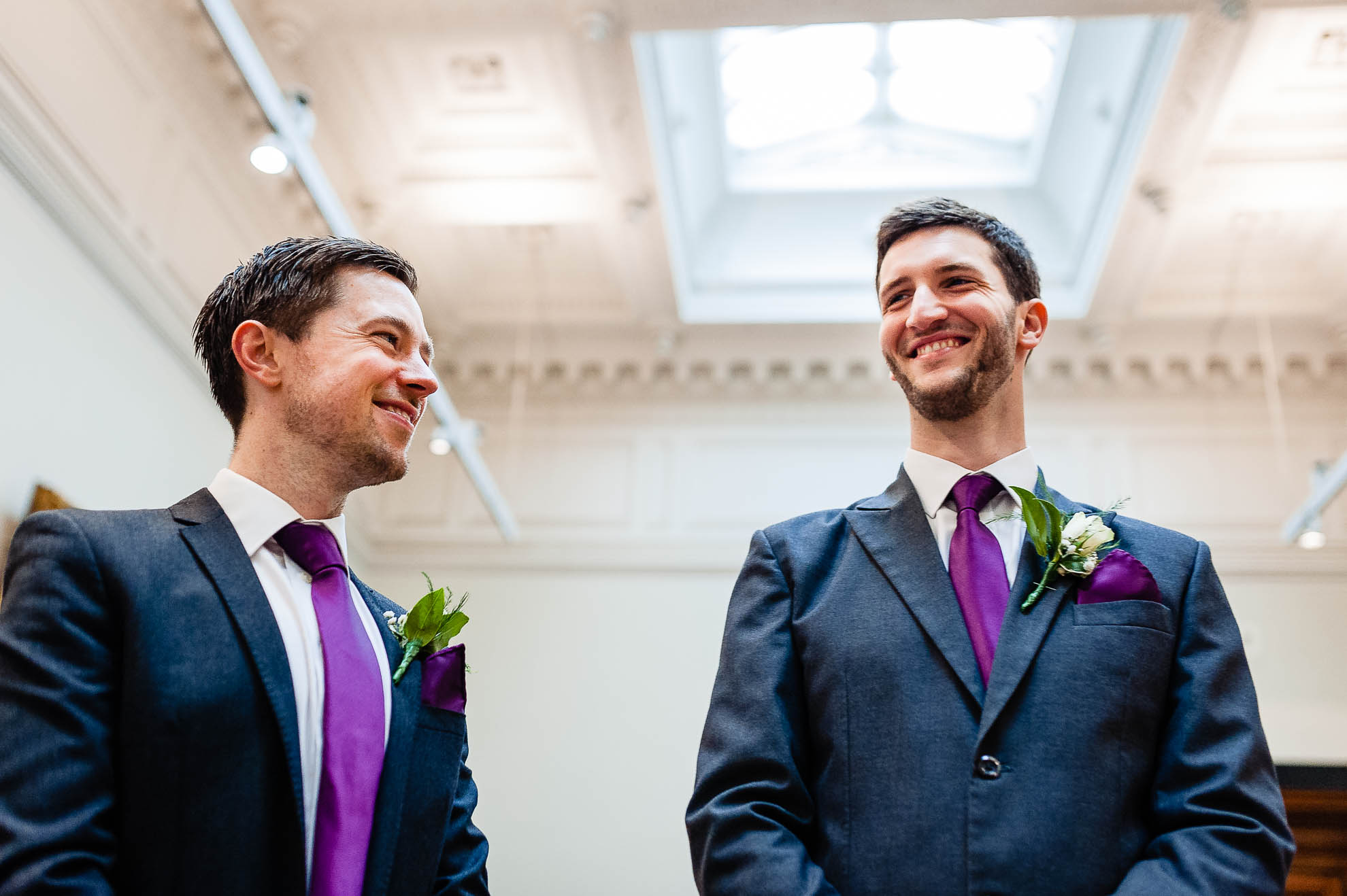 Groom share a joke with his best man