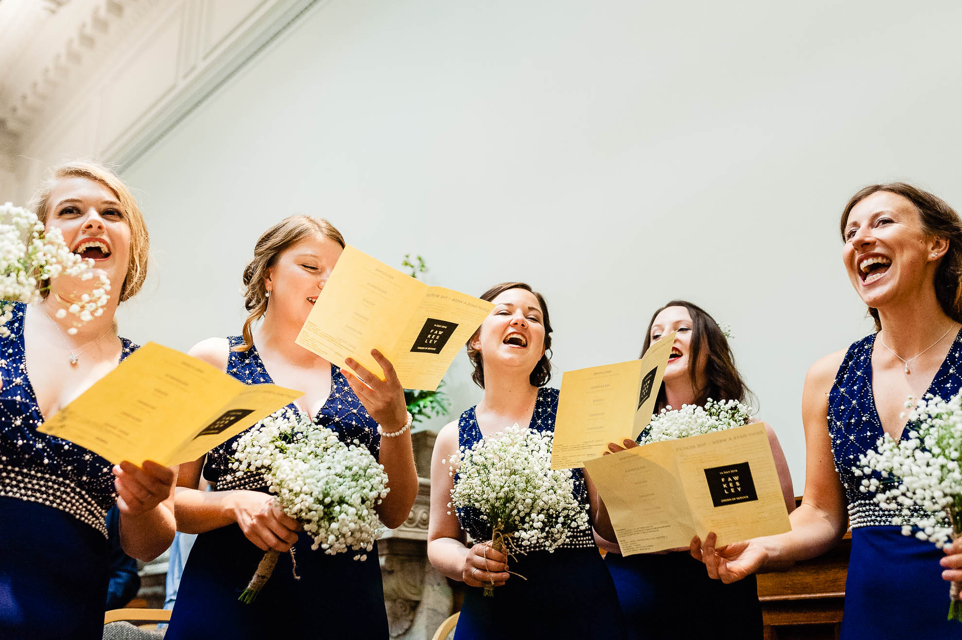 Bridesmaids sing 8 days a week song during ceremony