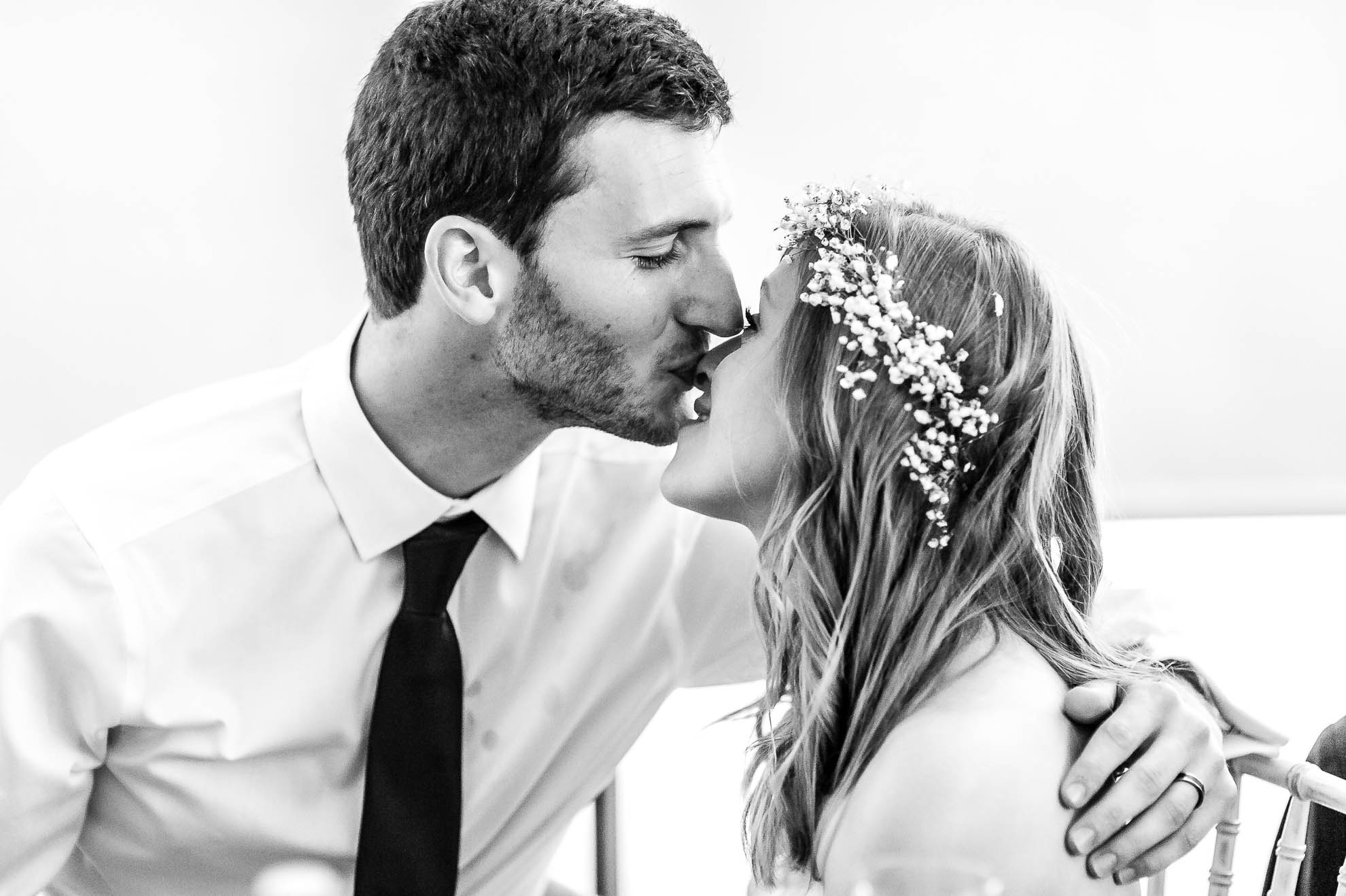 Groom kisses the bride on the nose