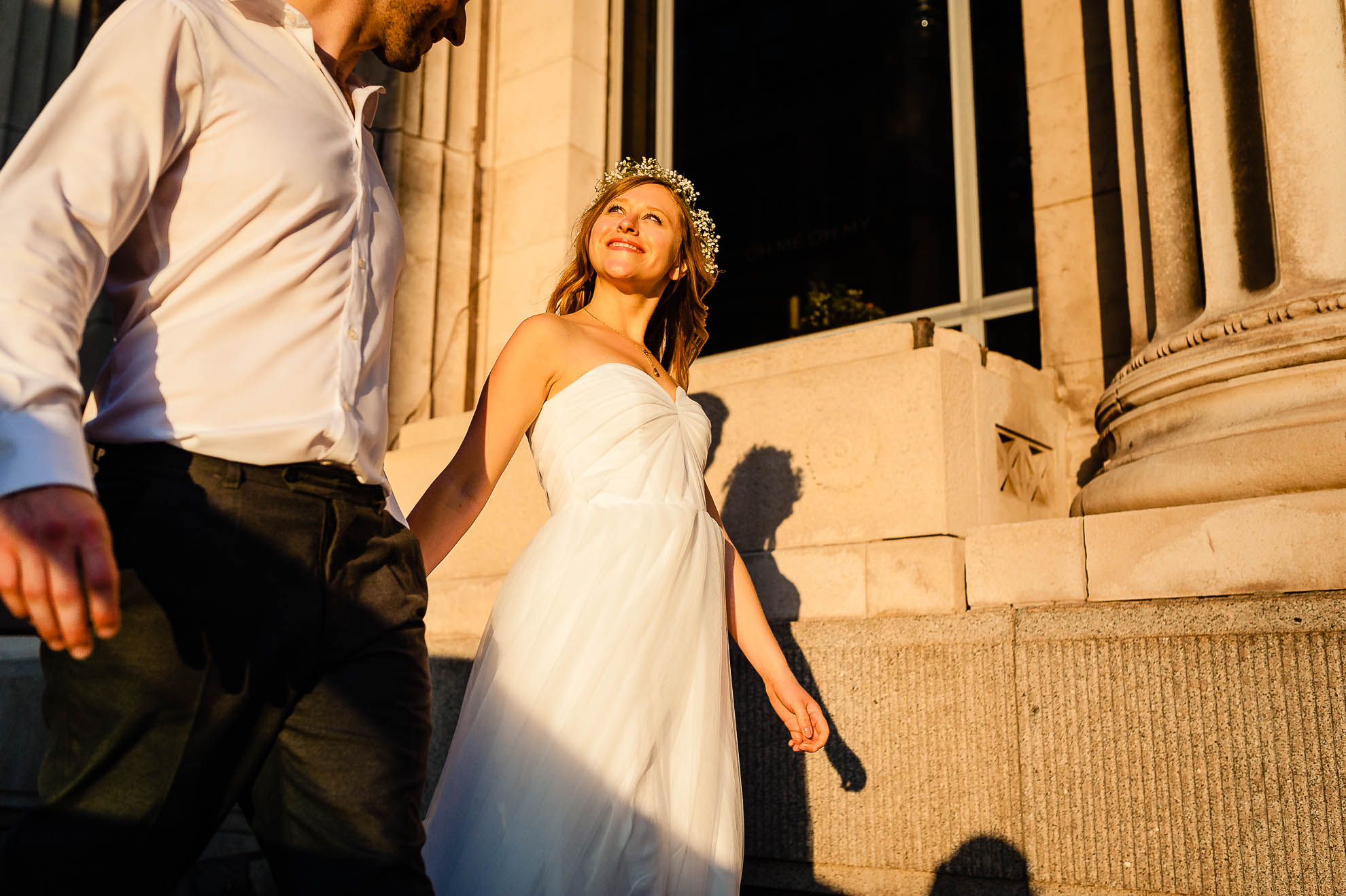 Bride and groom having a great time walking past Oh Me Oh My