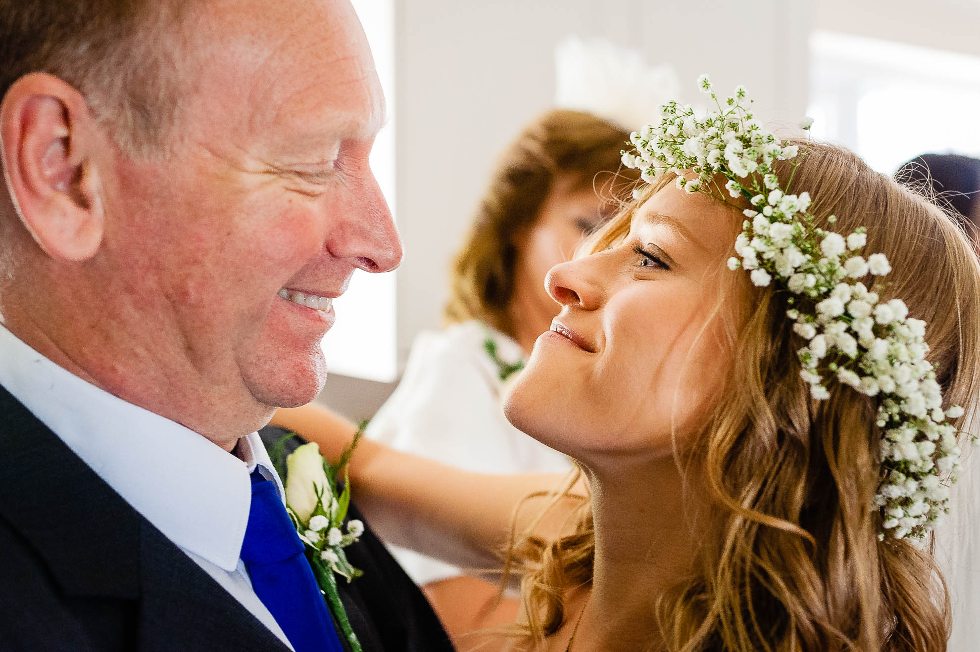 Bride hugs her father