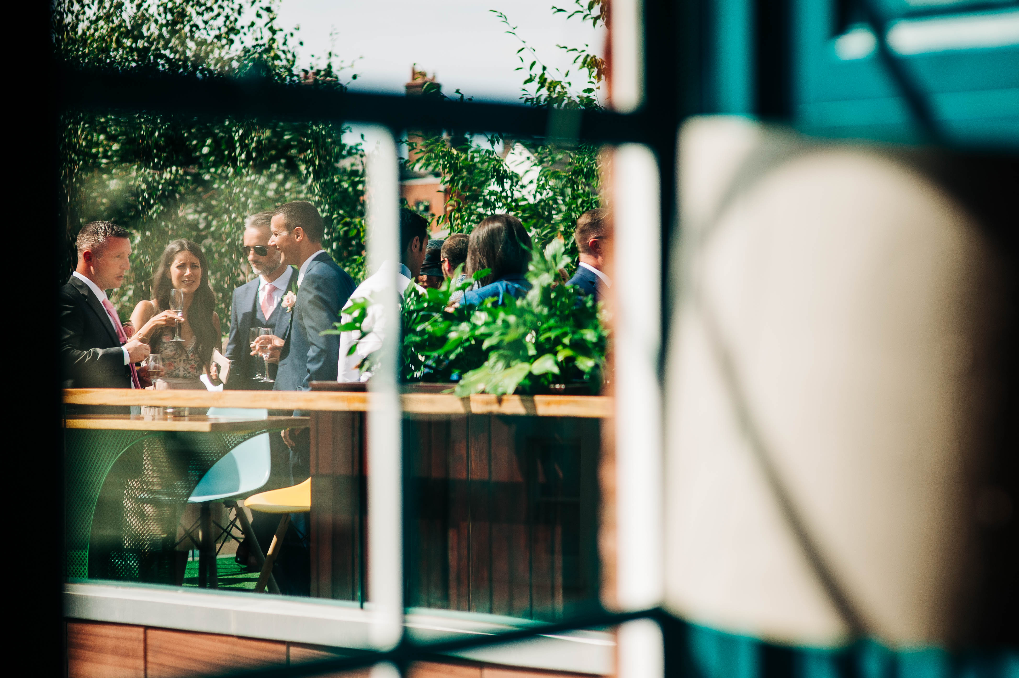Guests enjoying drinks on the private roof terrace