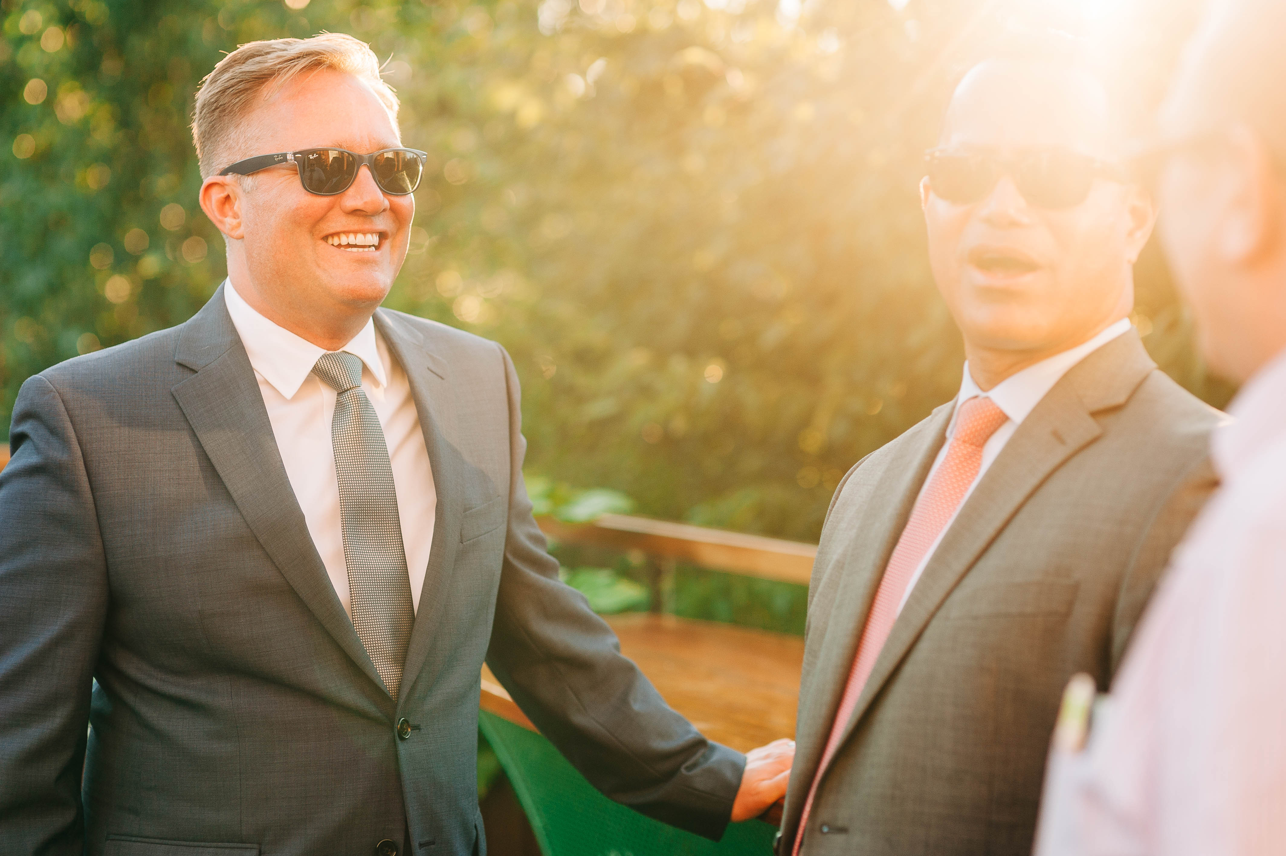 wedding Guests share a joke 