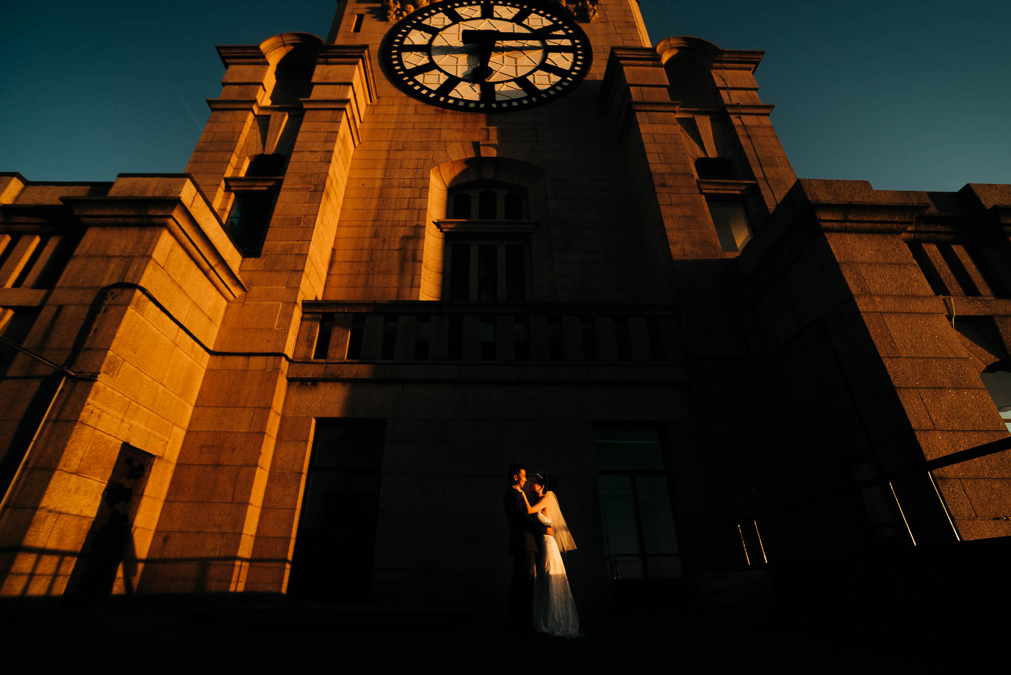 Bride and groom portrait under Liver Bird clock tower