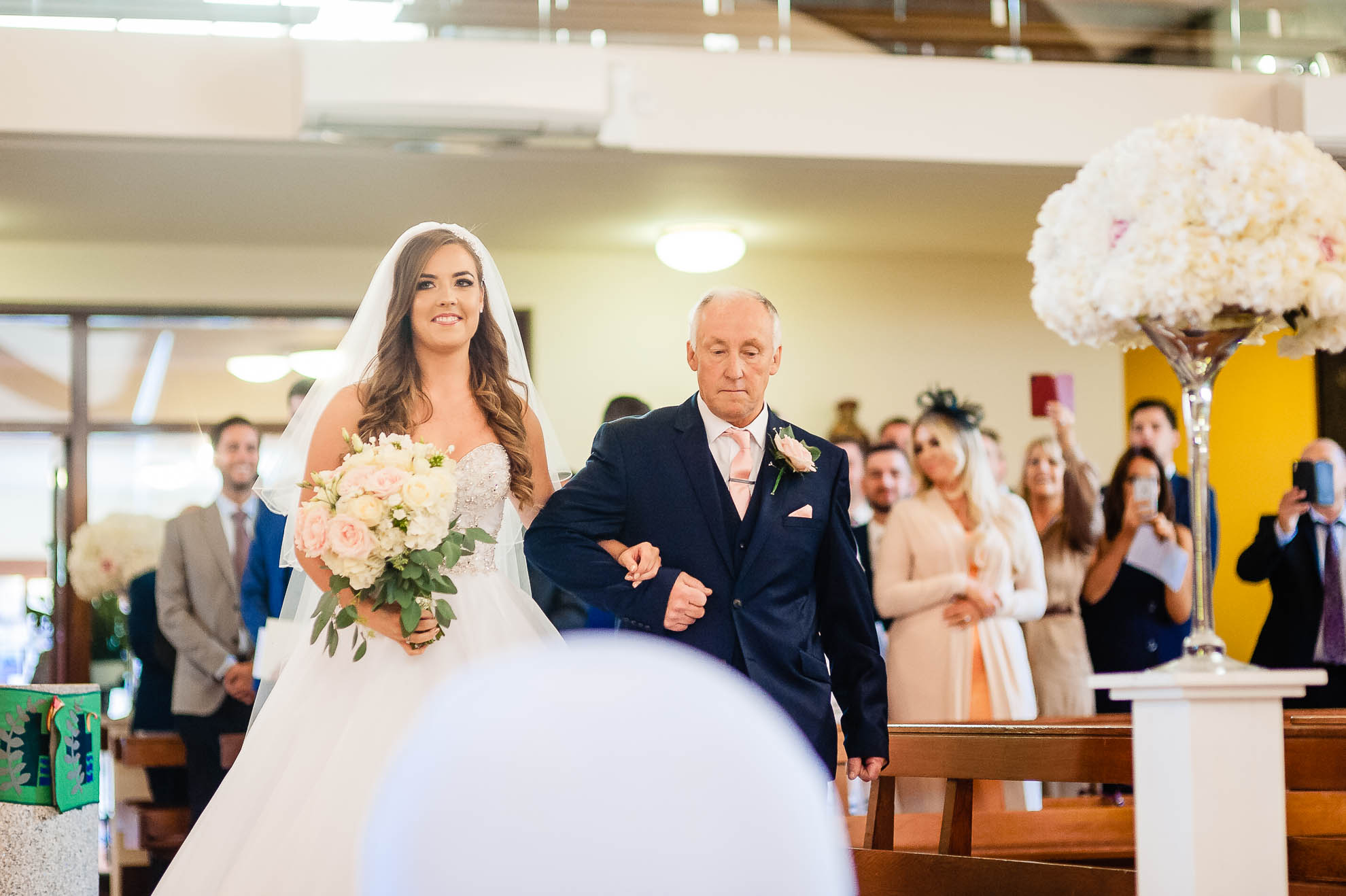 Bride walks up the aisle