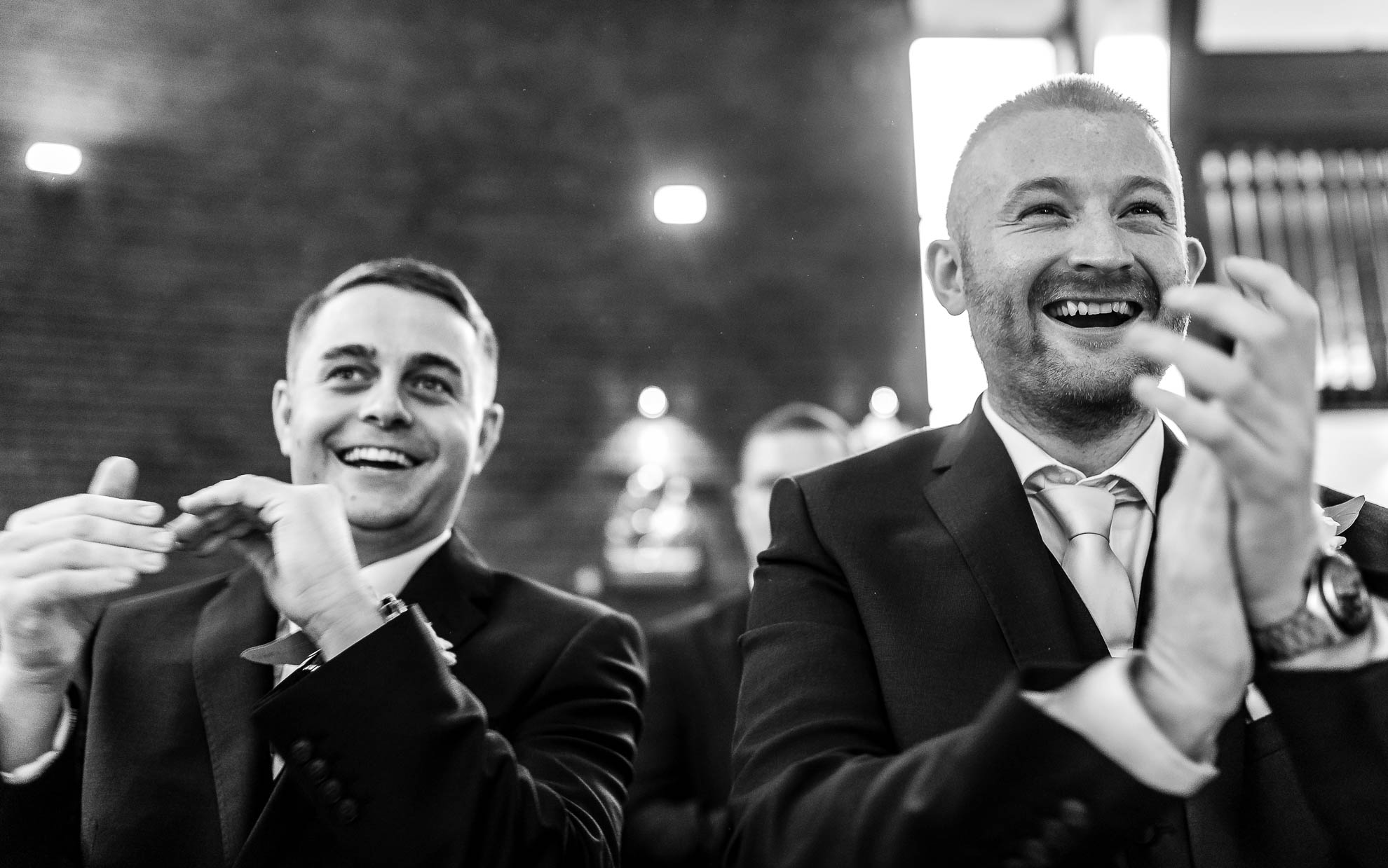 Best men congratulate the happy couple