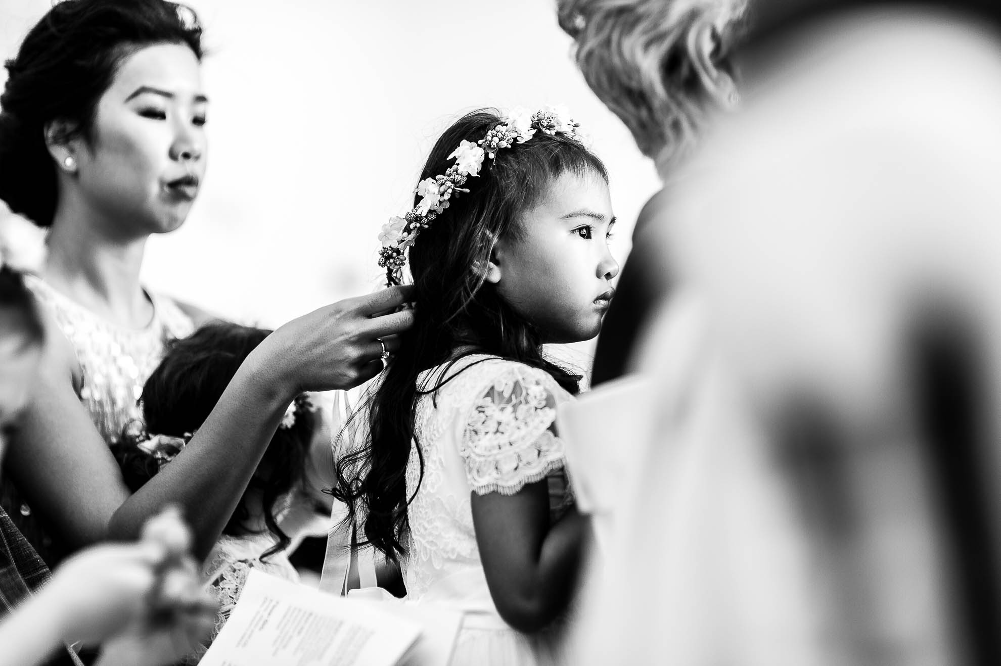 Flower girl watches the ceremony