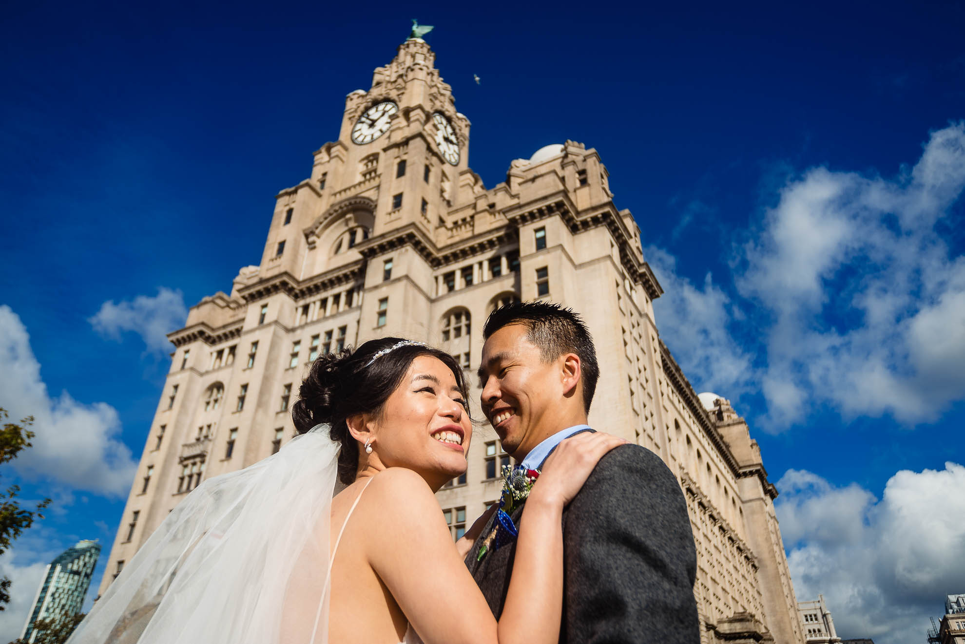 Bride and groom outside the Liver Building