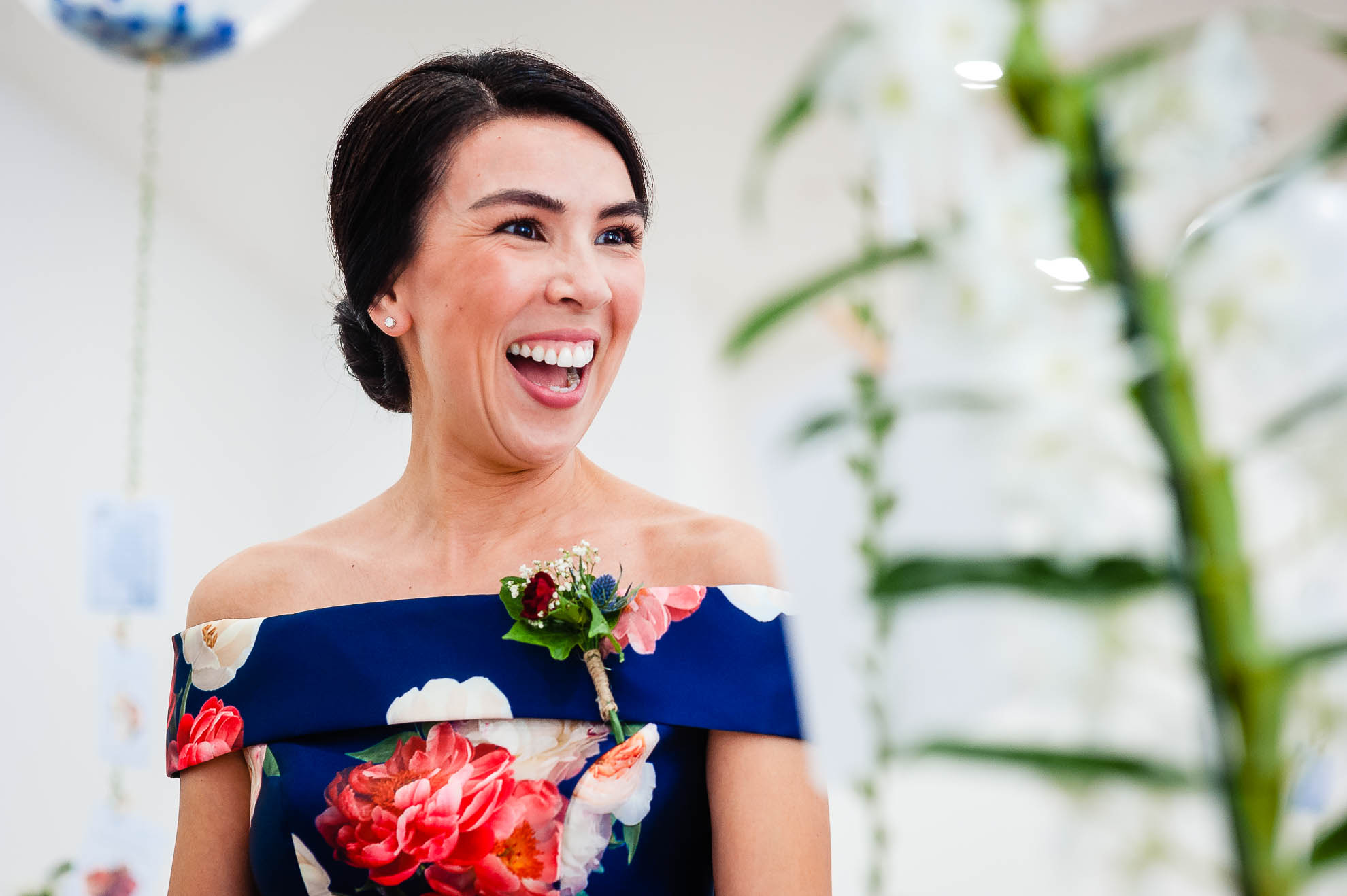 Grooms sister laughing during speechrs