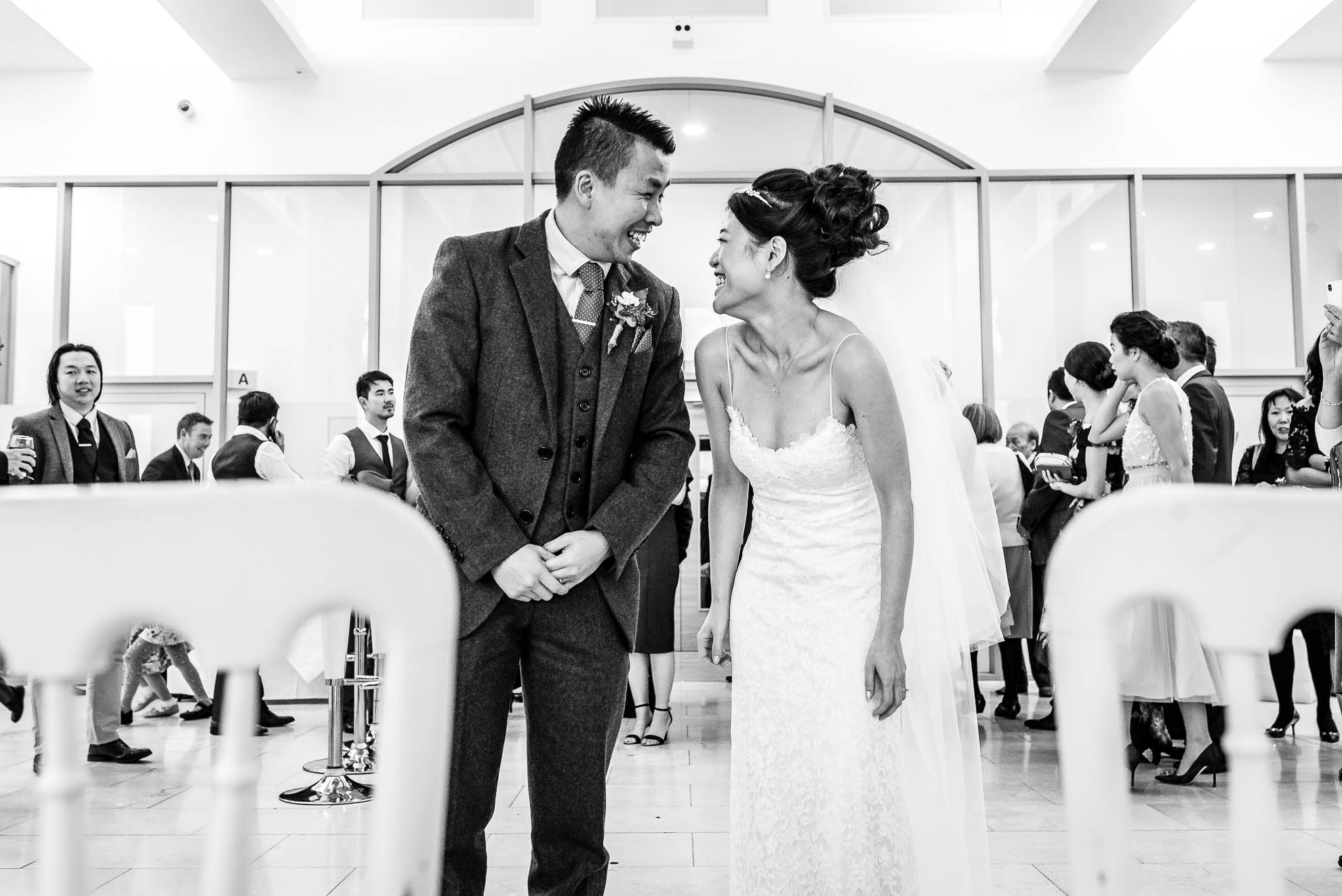 Bride and groom share a joke