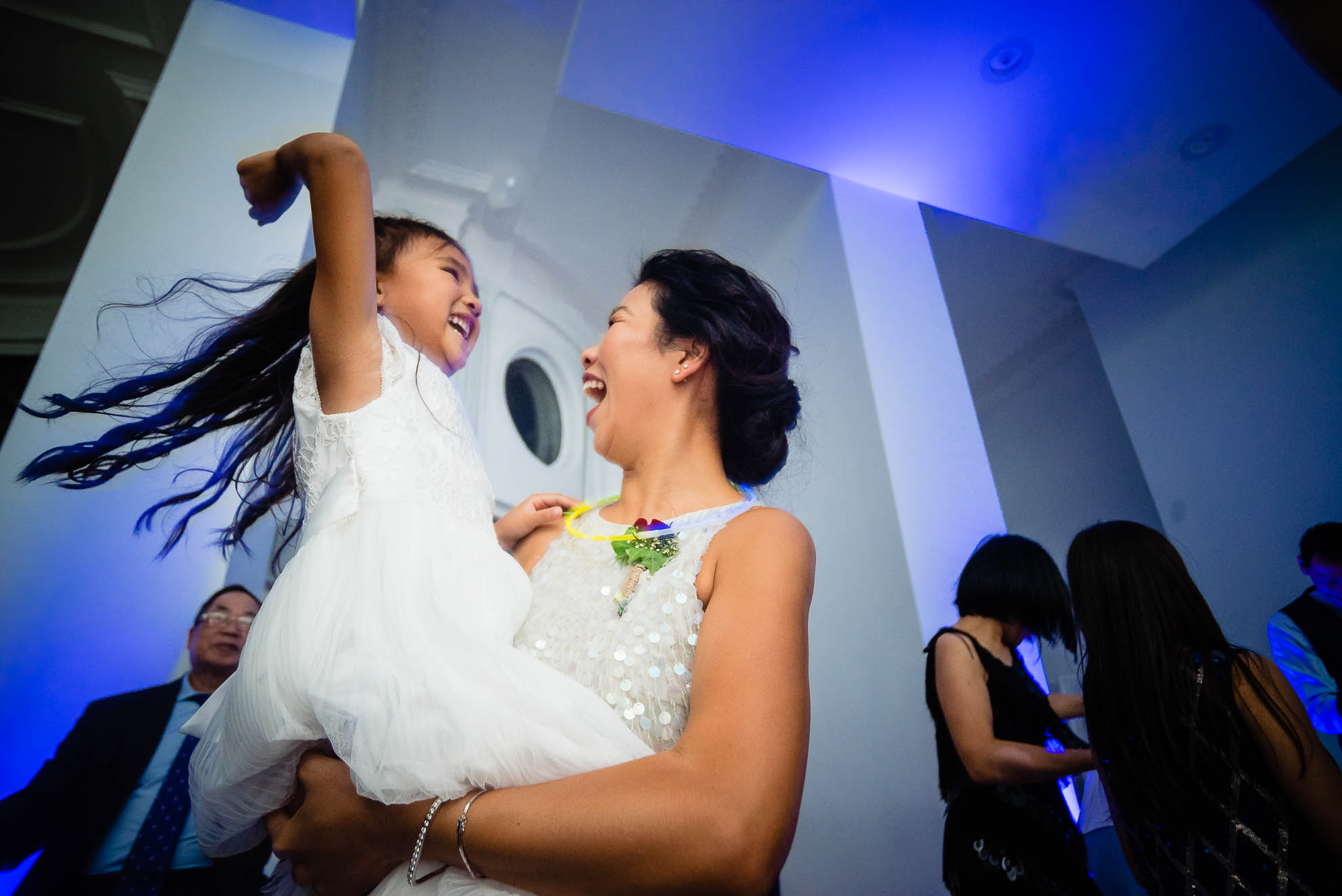 Flower girl dancing with her aunt