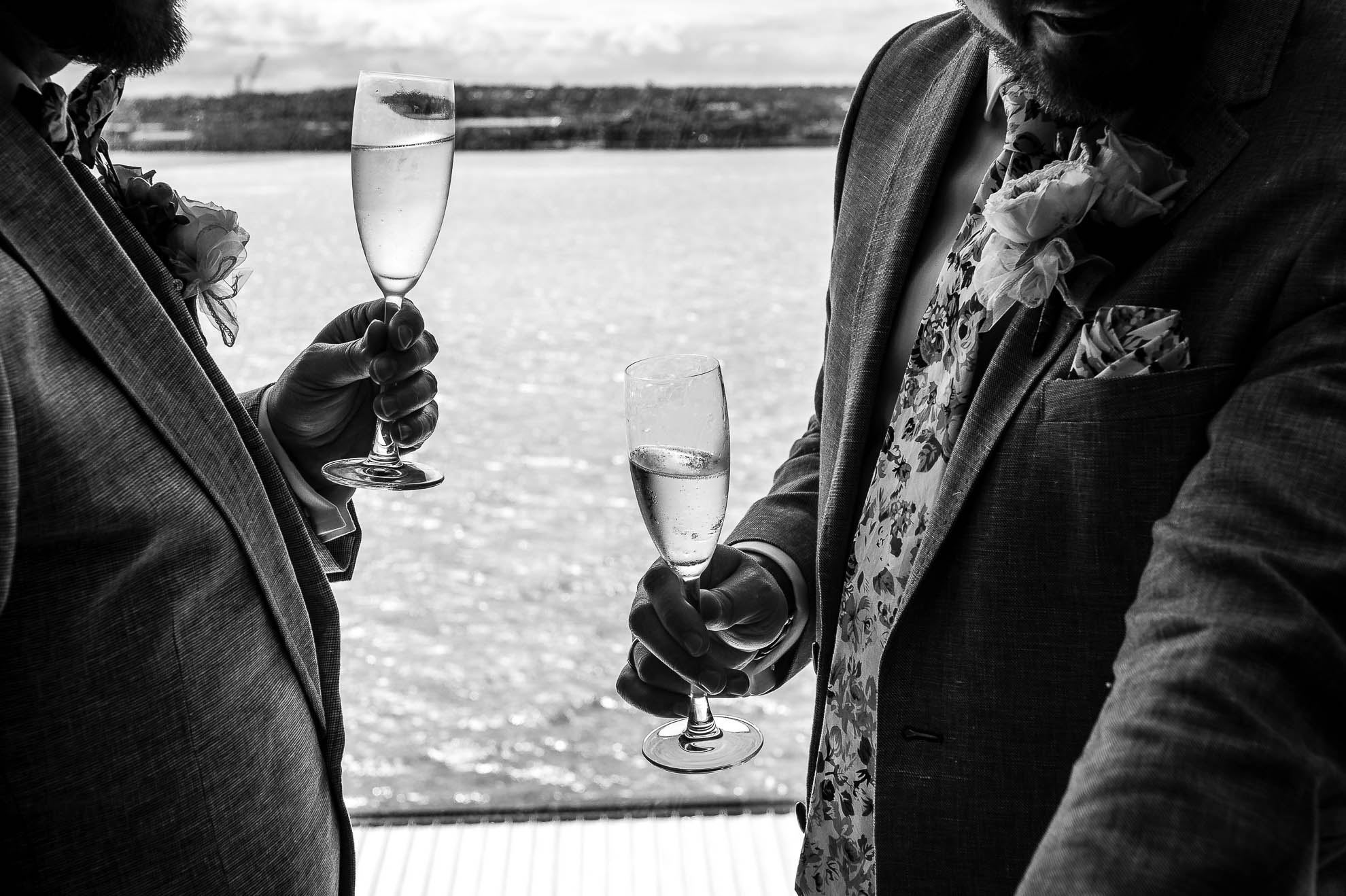 The happy couple enjoy a glass of champagne