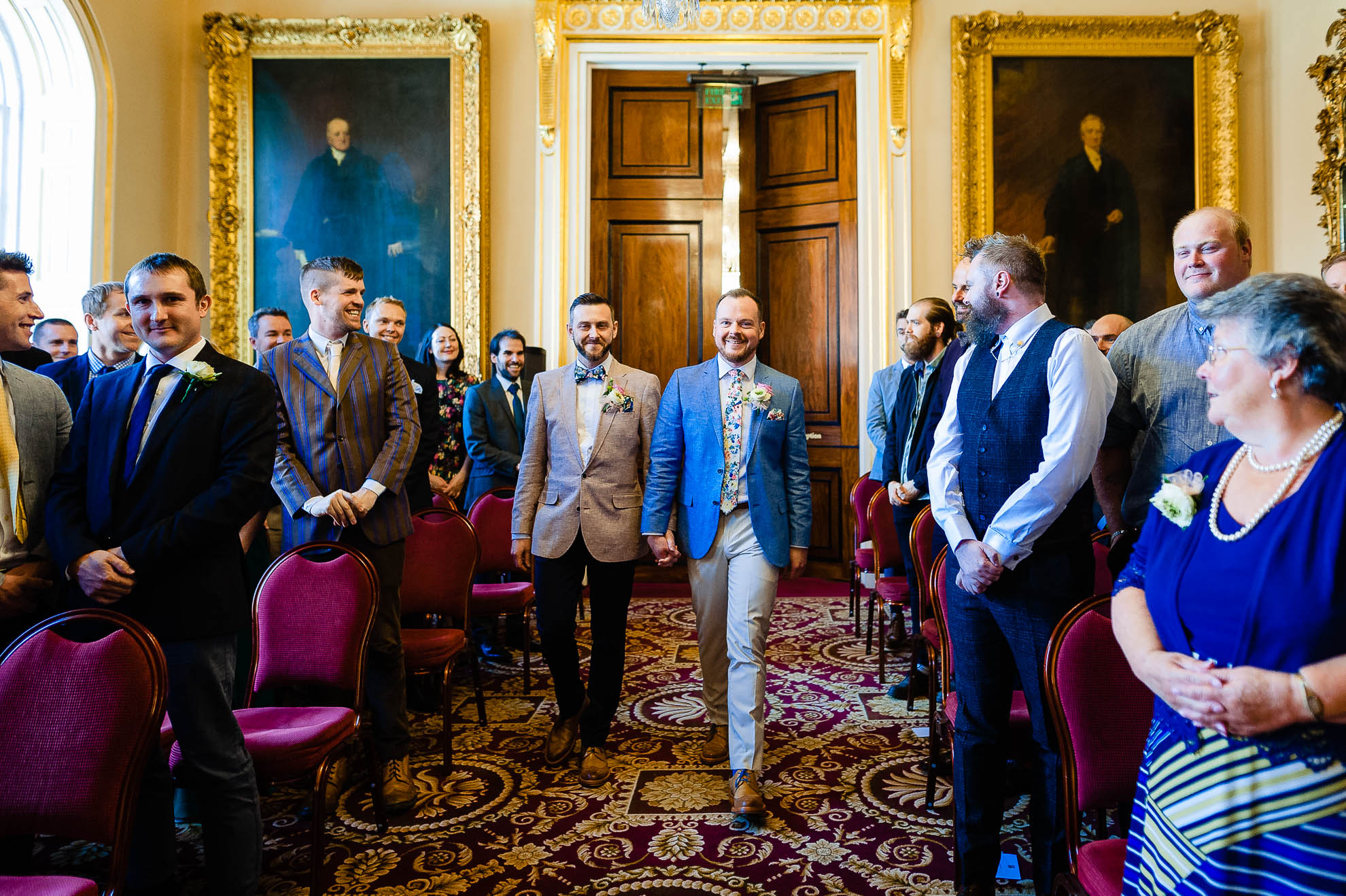 The happy couple enter the ceremony room together
