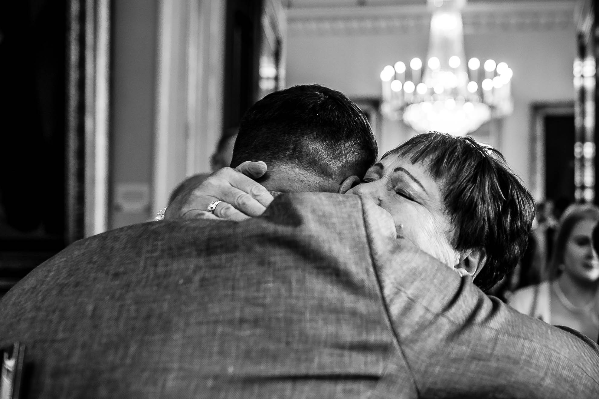 Grooms mum gives him a big hug